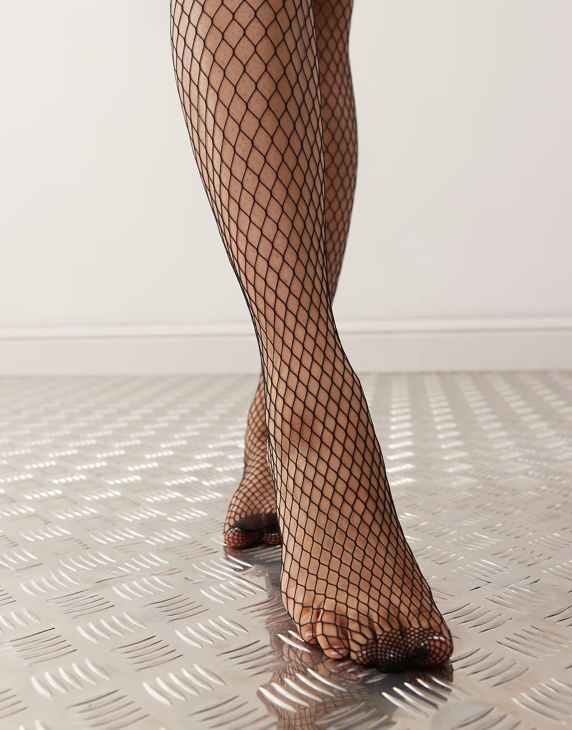 Pretty Polly fishnet tights in black | ASOS (Global)