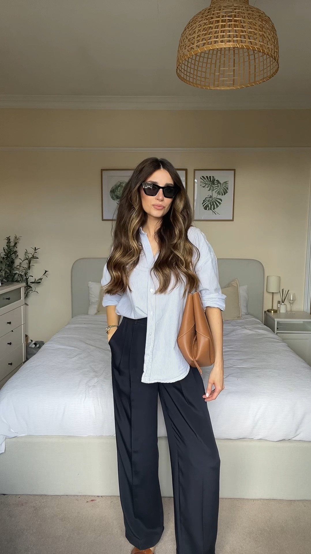 Blue stripe shirt, navy wide leg trousers, tan tote bag, tan sandals, cat eye sunglasses! Easy casual summer day outfit ☀️

#LTKuk #LTKsummer #LTKeurope