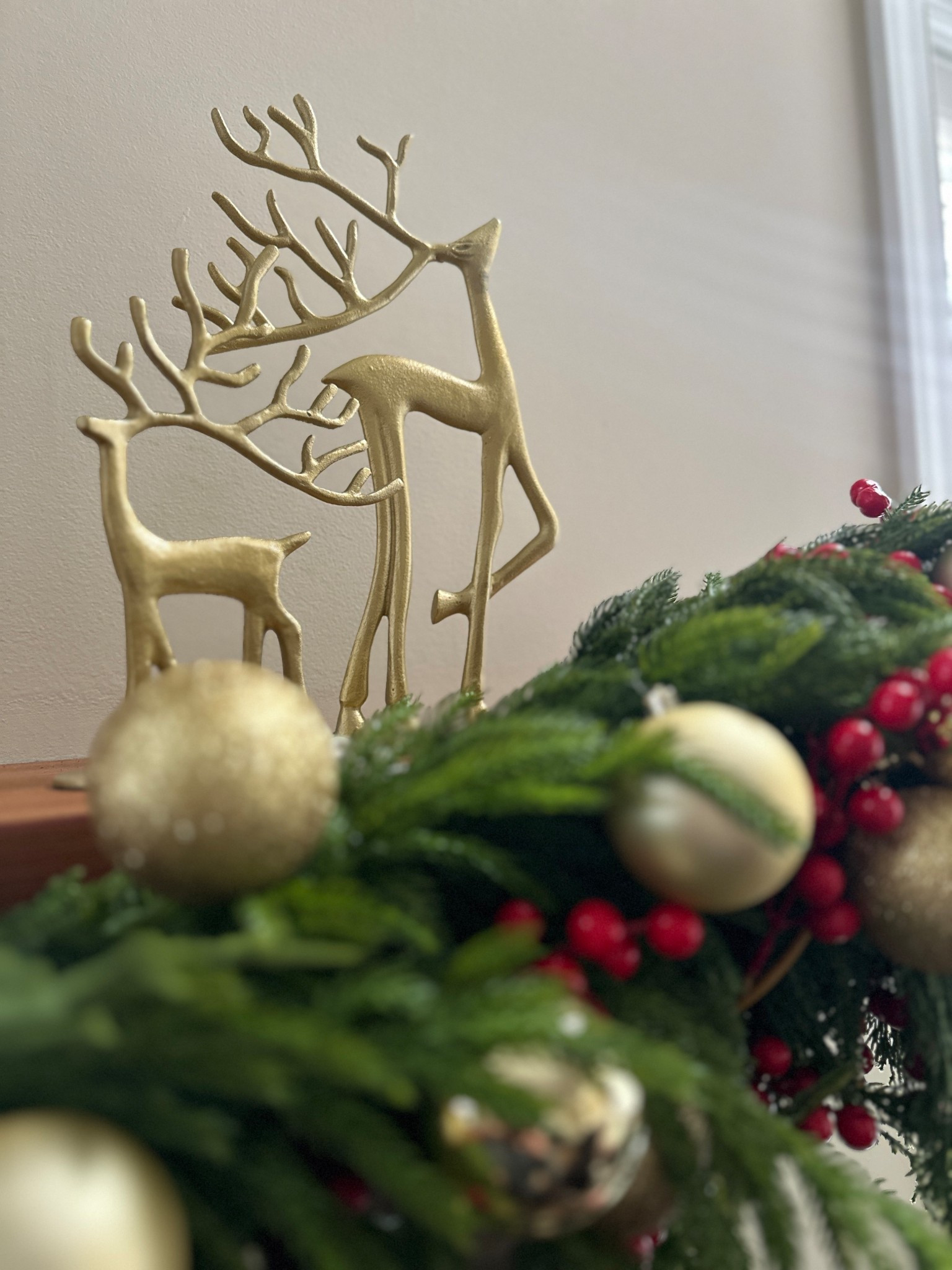Christmas decor details - Mantel garland with gold mental reindeer figures 

#LTKHome #LTKHoliday #LTKSeasonal