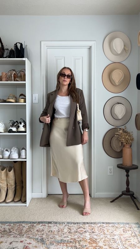 It's giving Parisian chic 🤍 
Blazer is from Venice Dream L
Skirt M 
Tank M 
.⁠
.⁠
.⁠
.⁠
blazer outfit, oversized blazer, Spring outfit, outfit inspo, minimal style, fashion inspo, outfit ideas, street style, Pinterest aesthetic, Pinterest girl, styling reels, spring style, summer style, casual chic, amazon fashion. 

#LTKworkwear #LTKunder50 #LTKstyletip