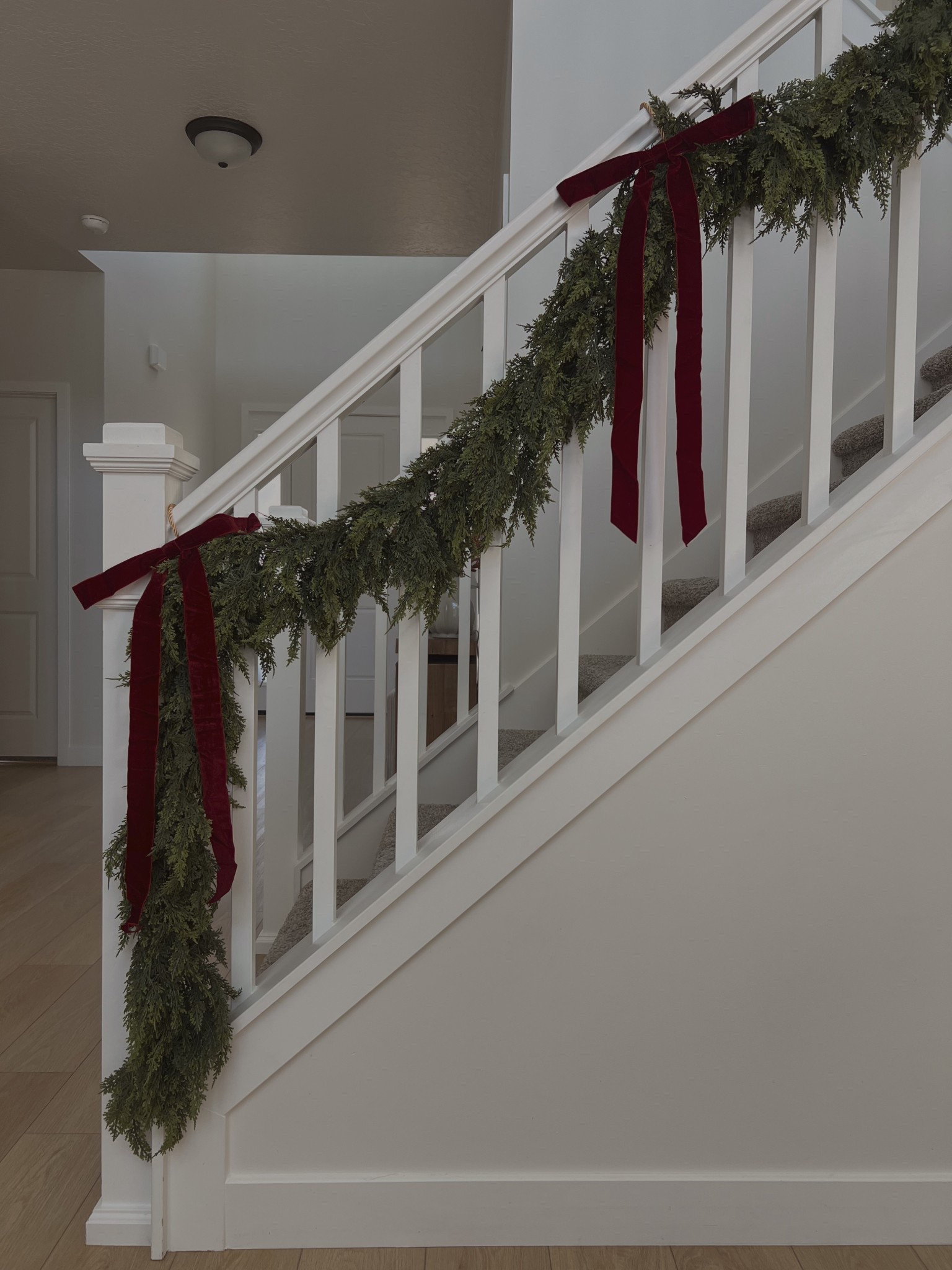 Amazon garland / stairs garland / mantle farms / affordable Christmas decor / Christmas home decor / burgundy Christmas / burgundy pre tied bows

#LTKHoliday #LTKHome #LTKSeasonal