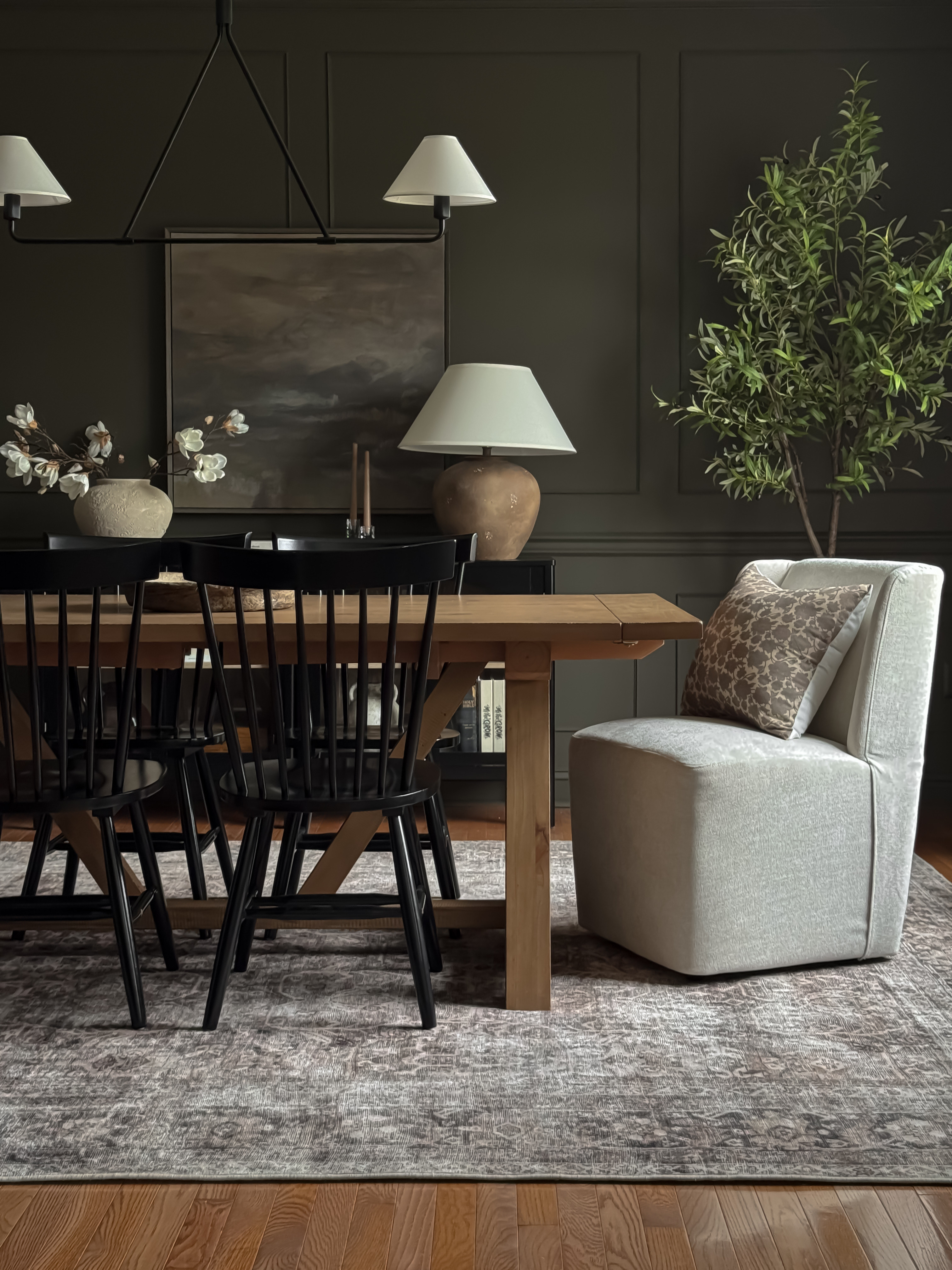 Wall color: Sherwin-Williams muddled basil 

Moody dining room, dark green dining room, dining room chairs, accent chairs, dining room table, dining room rug, dining room decor

#LTKHome