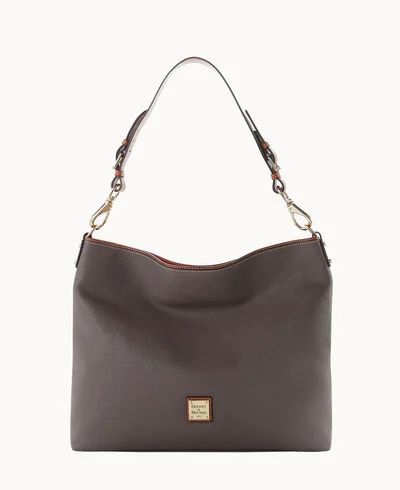 A Sleek Everyday Carry
Crafted with durable, pebbled leather and covetable slouch, this oversized... | Dooney & Bourke (US)
