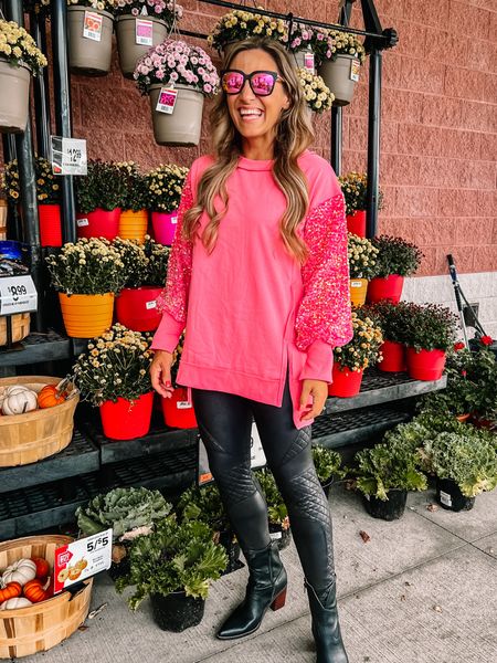 Nothing says fall like pink sparkles! Seriously though, I’m obsessed with thus whole look! Perfect fall look, or eras tour look, or Barbie inspired look! Faux leather leggings • spanx leggings • moto leggings • casual leggings • leather boots • black boots • sparkle sweatshirt • pink sweatshirt 

#LTKover40 #LTKfindsunder100 #LTKSeasonal