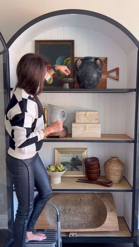 styling this beautiful arched cabinet by McGee and Co. I used a mix of old and new items. I used vintage art, artisan vases by pottery barn, Amazon finds like this water pitcher, some old target items and you have a layered cabinet. My sweater is also linked. Beigewhitegray 

Shop this post and daily finds by clicking the link in my bio.

#LTKhome #LTKstyletip #LTKSeasonal