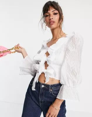 ASOS DESIGN textured jacquard crop top with ruffles and tie front in ivory | ASOS (Global)