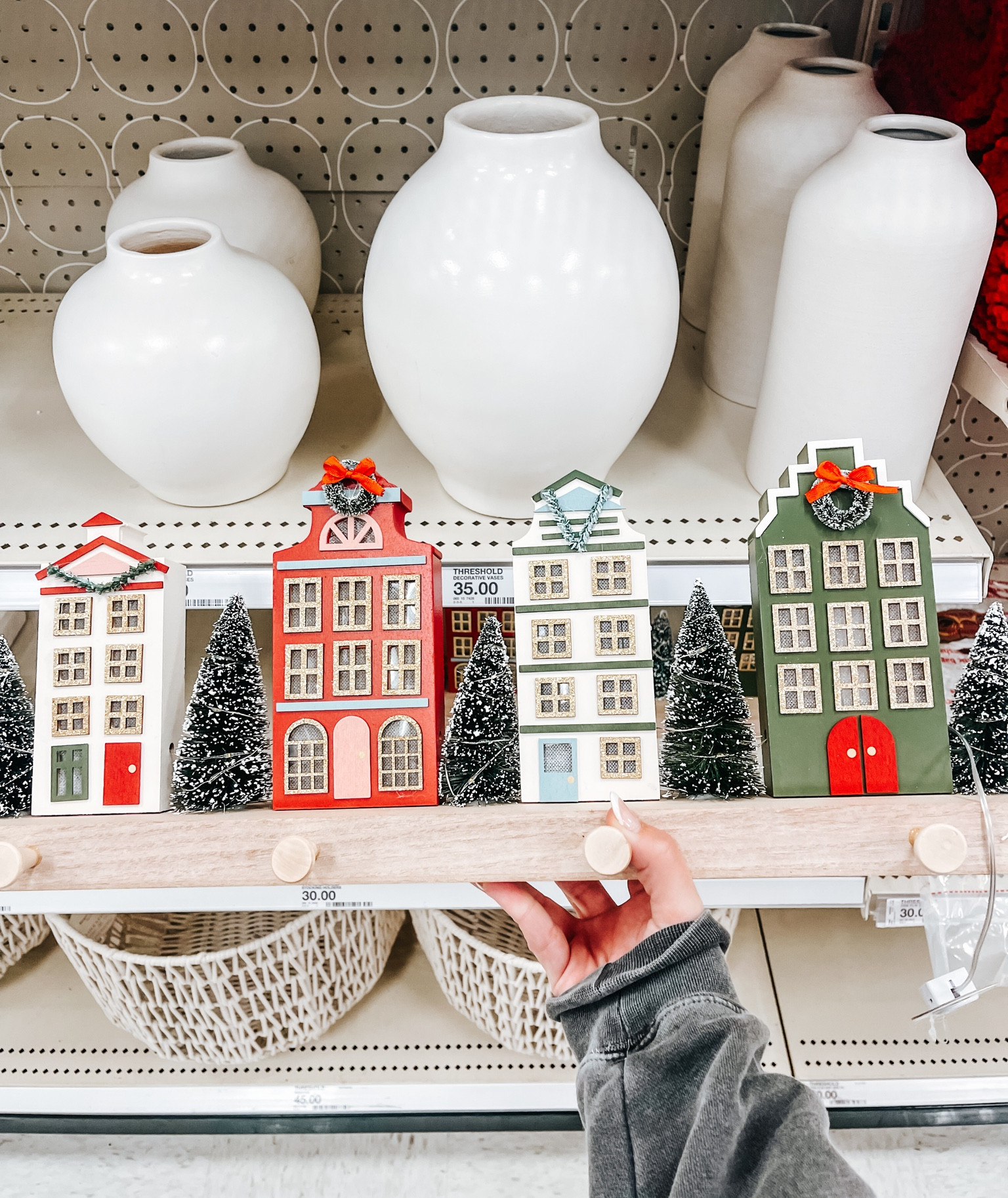 my stocking holder is back! I’ve had mine for three Christmas seasons now, it sells out every year. the houses and trees light up

#LTKSeasonal #LTKHoliday #LTKhome