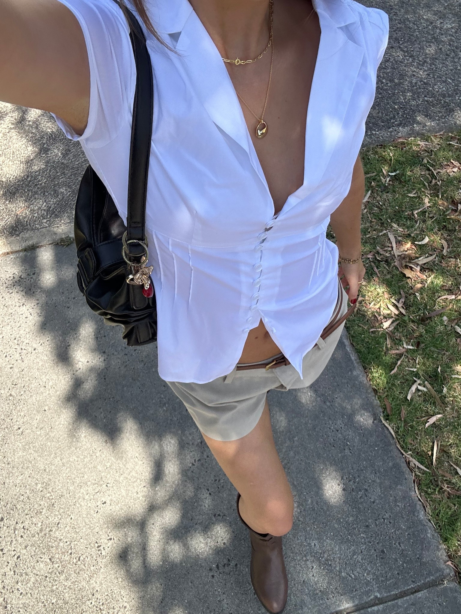 Button up white blouse top, button up shirt outfit, tailored shorts styling, work outfit ideas, smart casual, Pinterest fashion, 2025 style, knee high boots, Moto boots, ootd 

#LTKsummer #LTKworkwear #LTKaustralia
