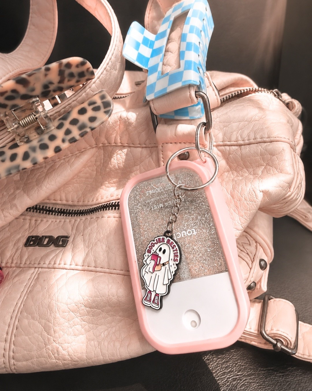 Bag charms + hair claw clips + hand sanitizer + case

#LTKmomlife #LTKdayinmylife #LTKU