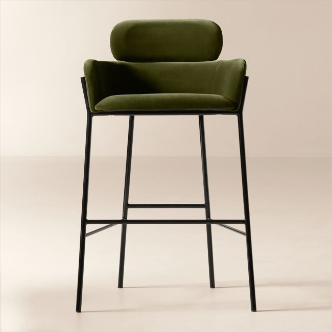 Forest green velvet bar stool with sculptural curved back