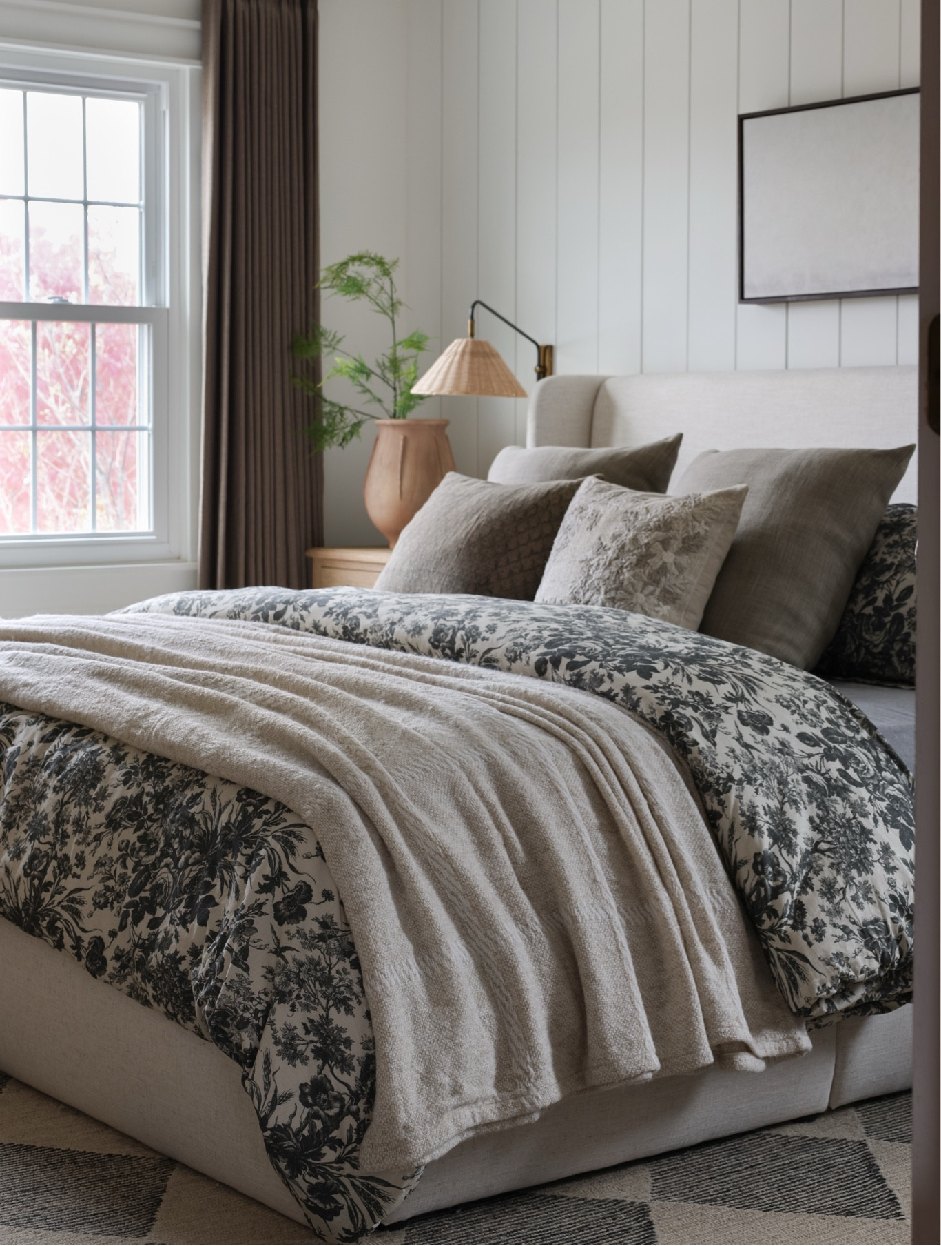 Bedroom furniture, storage bed, floral bedding, windowpane throw blanket, rattan wall sconce, plug in wall sconce, throw pillows, pottery barn, upholstered bed 

#LTKHome #LTKSaleAlert