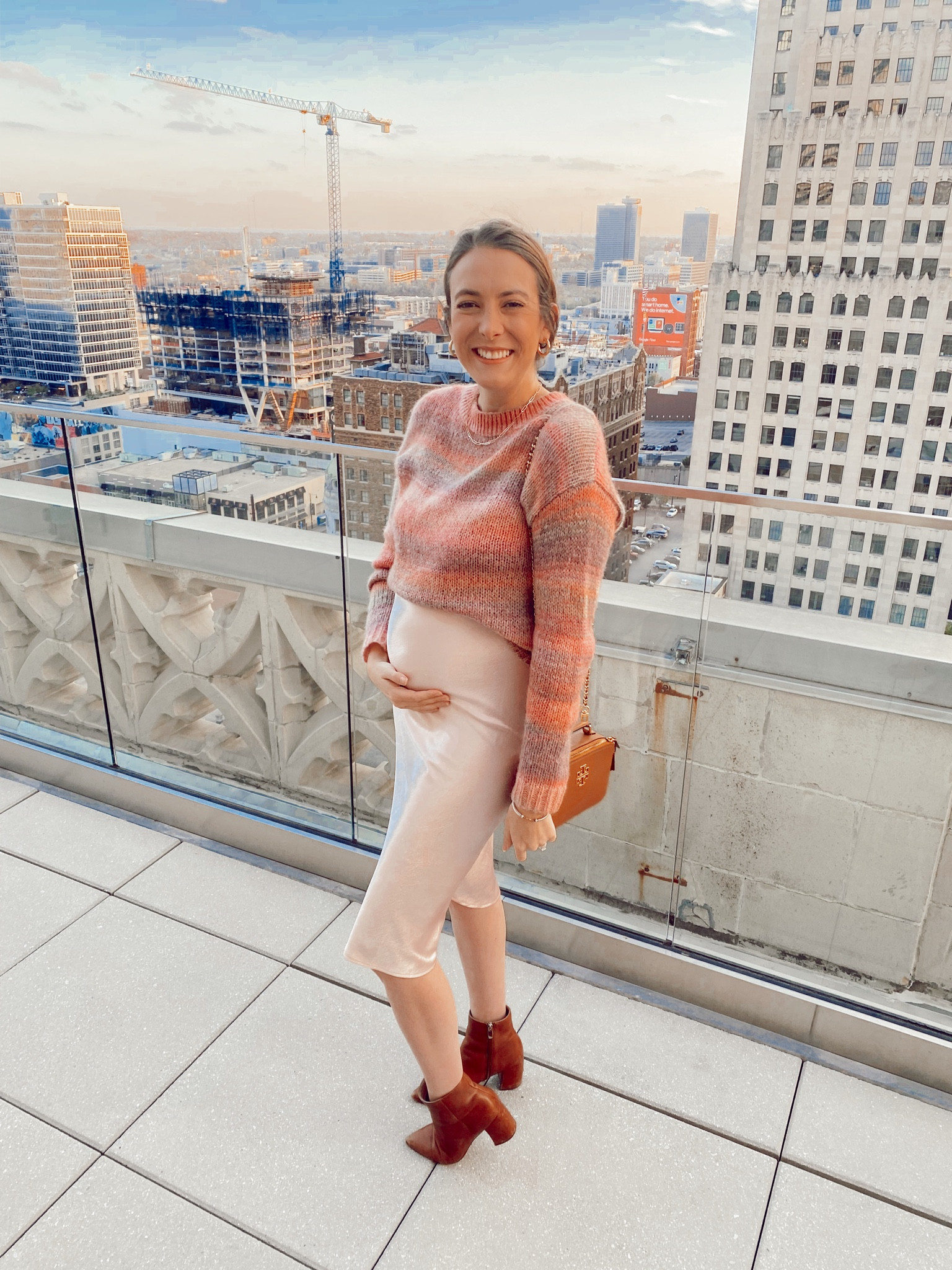 Bump maternity friendly sweater, and dress combo with the sweater tucked with brown booties

#LTKbump #LTKSeasonal #LTKfamily