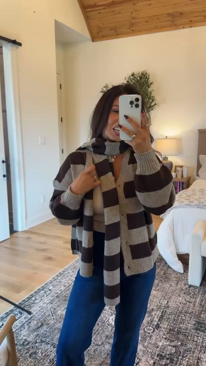 Cozy stripes for the win 🤎 This oversized striped sweater and matching scarf are perfect with wide-leg jeans for an easy, put-together cold-weather look.
#CozyOutfit #StripedSweater #FallFashion #WinterStyle