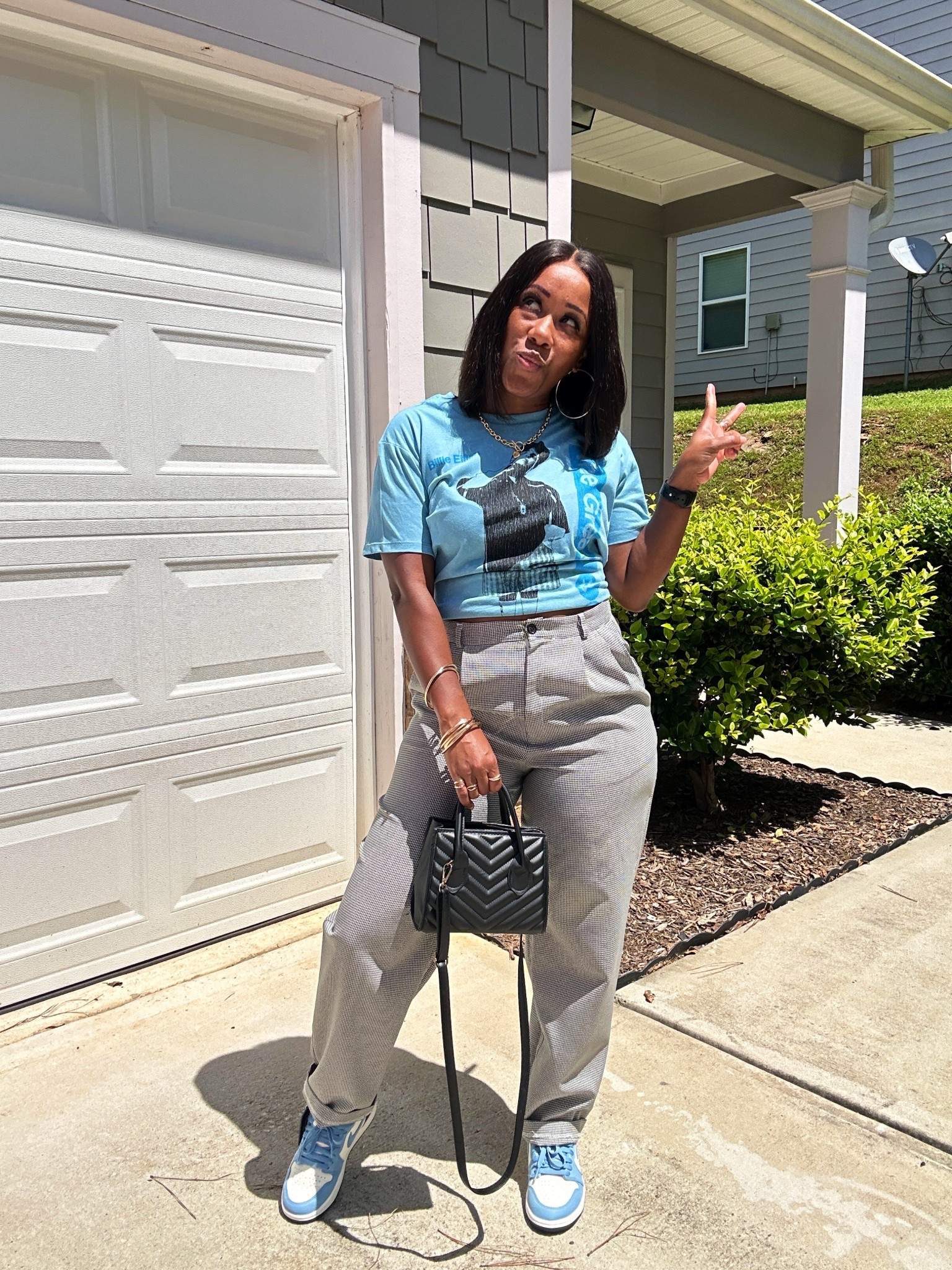 I’m wearing a blue and black graphic tee with trouser pants. I styled this fall outfit with a black purse, gold jewelry, and first in flight Jordan 1 sneakers

#LTKStyleTip #LTKPetite #LTKOver40