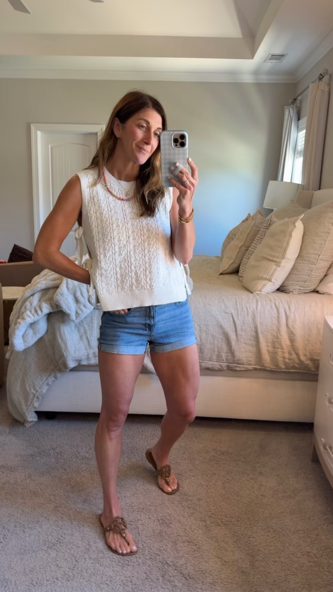 Top is Vici on sale. Size medium. Crotchet sweater material with functional ties on the side. Perfect for elevated, yet comfy summer style!

Shorts are American Eagle -old-linking similar 

Jewelry, shoes, and loopy also linked. (10% off loopy-code: watsonansley10)

Shorts | jeans | denim | American Eagle | AE | tank | top | ties | loopy | electric picks | cross necklace | beaded necklace | Allie + bess | Tory Burch millers | sandal | sale | cute | mom styles

#LTKmomlife #LTKSaleAlert #LTKootd