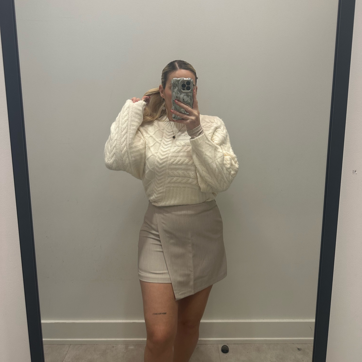 Cable knit cream sweater and light grey skort for a preppy autumn vibe 🍂 

#LTKfindsunder50 #LTKSeasonal #LTKHoliday