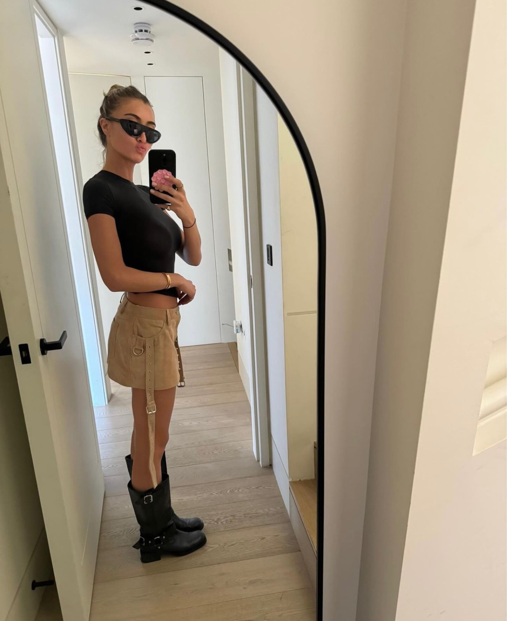 spring outfit, skirt outfit, mid calf boots, skims tshirt, celine sunglasses, fits everybody tshirt, biker boots, steve madden boots, leather skirt, tan skirt, casual outfit, basics

#LTKshoecrush #LTKsalealert #LTKeurope