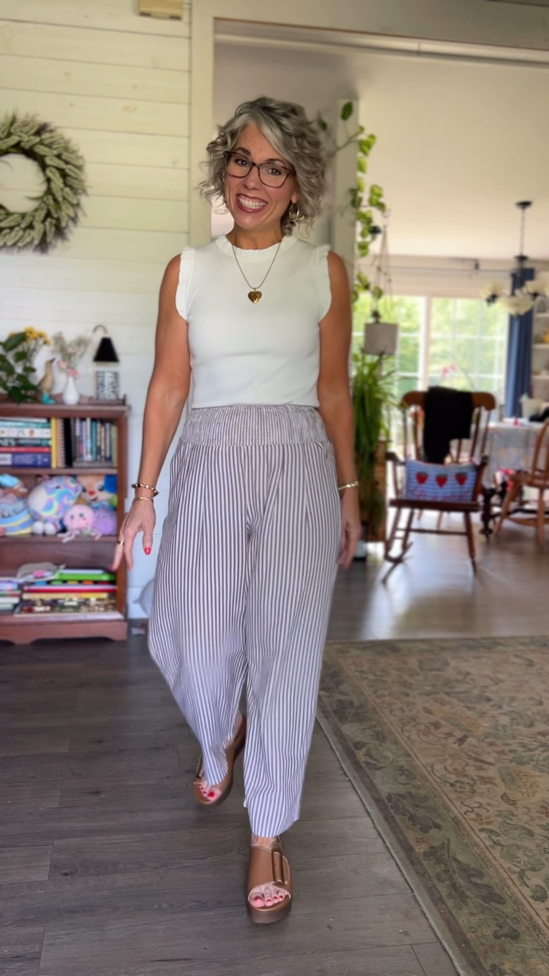 Y’all I’ve been on a roll lately!  This outfit is AMAZING!  The pants are soooo good with the stripes, smocked waist, pockets and are perfectly petite friendly. They are breathable so perfect for this heat and I got my normal size small but if you’re in between I would size up cause I don’t have a lot of extra room. My sleeveless sweater tank top is soooo pretty and that ruffle trim melts me. I’m wearing a small in this too. 

#amazonfashion #amazonfinds #amazonstyle #founditonamazon #summerstyle #summeroutfit #summerfashion #summerinspo #summervibes #summerlook #summerwear #springfashion #springoutfit #springstyle #casualoutfit #casualstyle #casualchic #effortlessstyle #effortlessfashion #ootd #ootdfashion #outfitoftheday #outfitinspo #outfitideas #realoutfitgram #todaysoutfit #affordablefashion #affordablestyle #budgetfashion #womensfashion #womensstyle #petitestyle #petitefashion #petiteoutfit #petitewomen #petitegirl #petites #momstyle #momfashion #momootd #momlife #teacherstyle #teacherfashion #grandmastyle #grandmafashion #over40style #over40fashion #over40andfabulous #fashionover40 #womenover40 #over50style #over50fashion #fashionover50 #agelessstyle #midlife #midlifestyle #midlifefashion #maturestyle #maturefashion #fashionblogger #fashionista #styleinspo #fashioninspo #instafashion #cuteoutfit #trending #fashion #style #ltkfinds #ltkunder50 #ltkover50 #ltkfashion #ltkstyle #ltksummer #ltkspring #liketoknowit #shopltk #stripedpants #smockedwaist #pocketpants #cottonstyle #sleevelesstop #tanktopp #ruffletrim #petitepants #summerstripes #breathablefashion #cottonpants #summerpants

#LTKSeasonal #LTKPetite #LTKOver40
