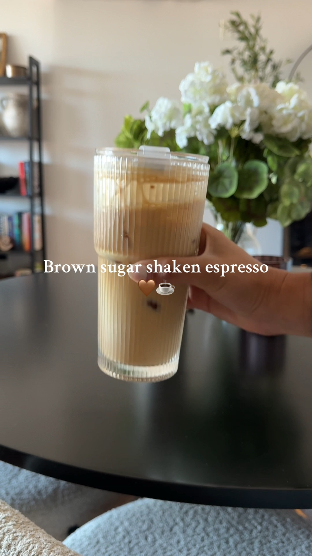 My go-to coffee lately has been this brown sugar shaken espresso. I use my Nespresso machine with the Bianco Doppio for Milk pod, one scoop of brown sugar, a dash of cinnamon, and shake it up.

If you’re like me and don’t love overly sweet drinks, follow the video and keep it light. If you do have a sweet tooth, just double the sugar and cinnamon!

I pour it over ice in my favorite glass to-go cup  Quick, easy, and tastes like a fancy café drink without leaving your kitchen. ☕🤎

#LTKOver40 #LTKU #LTKHome