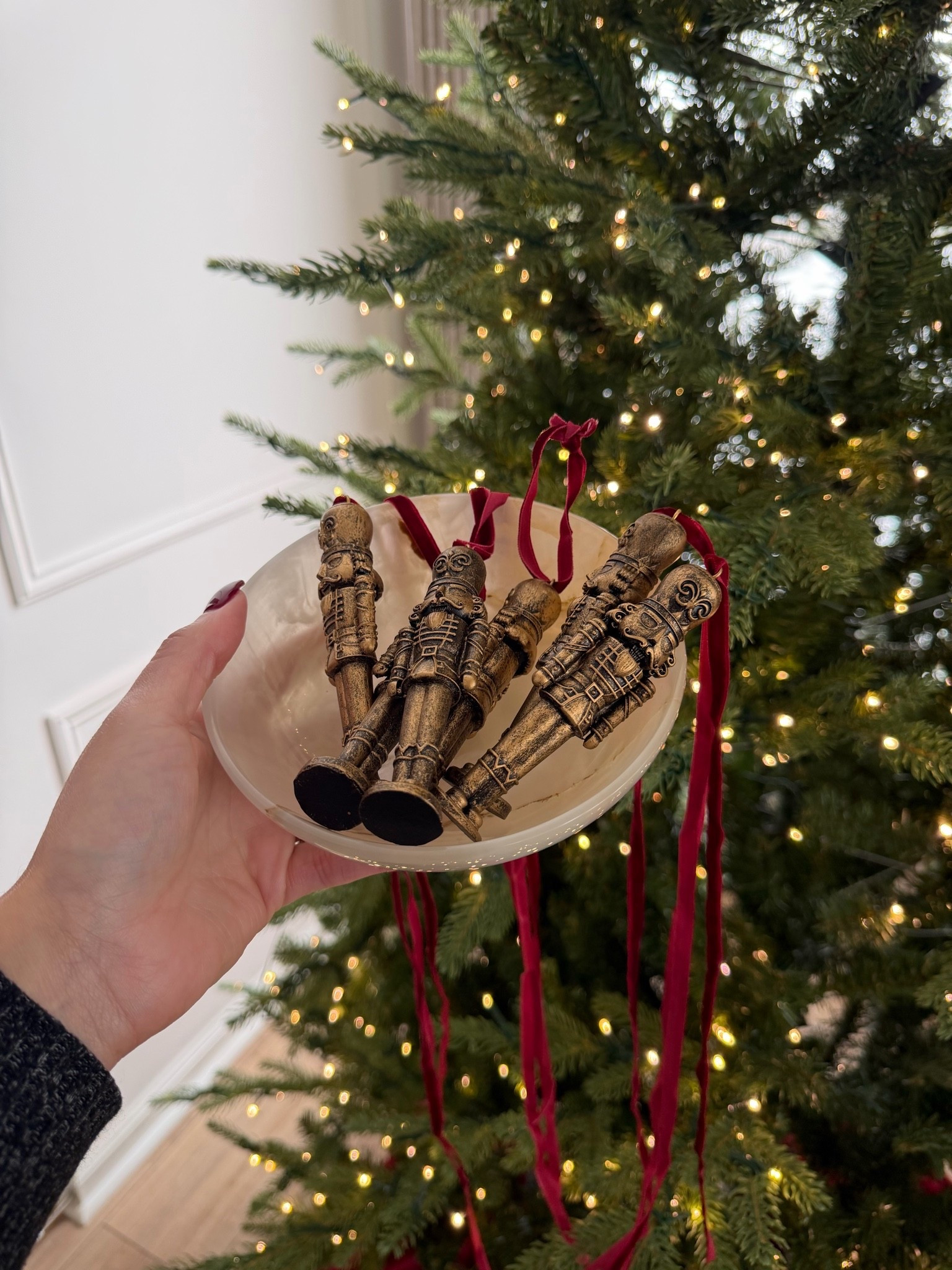 The most beautiful Christmas nutcrackers ornaments for your Christmas tree. I love the vintage style. Looks like old world Christmas decor vibe. 

Nostalgic Christmas, gold nutcrackers, brass Christmas ornaments , Christmas 2026