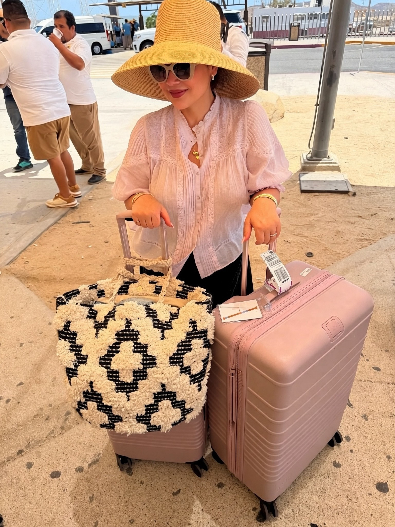 My pink luggage from @beistravel is the best! I have the entire set and highly recommend (bonus: it looks great with your outfit!)