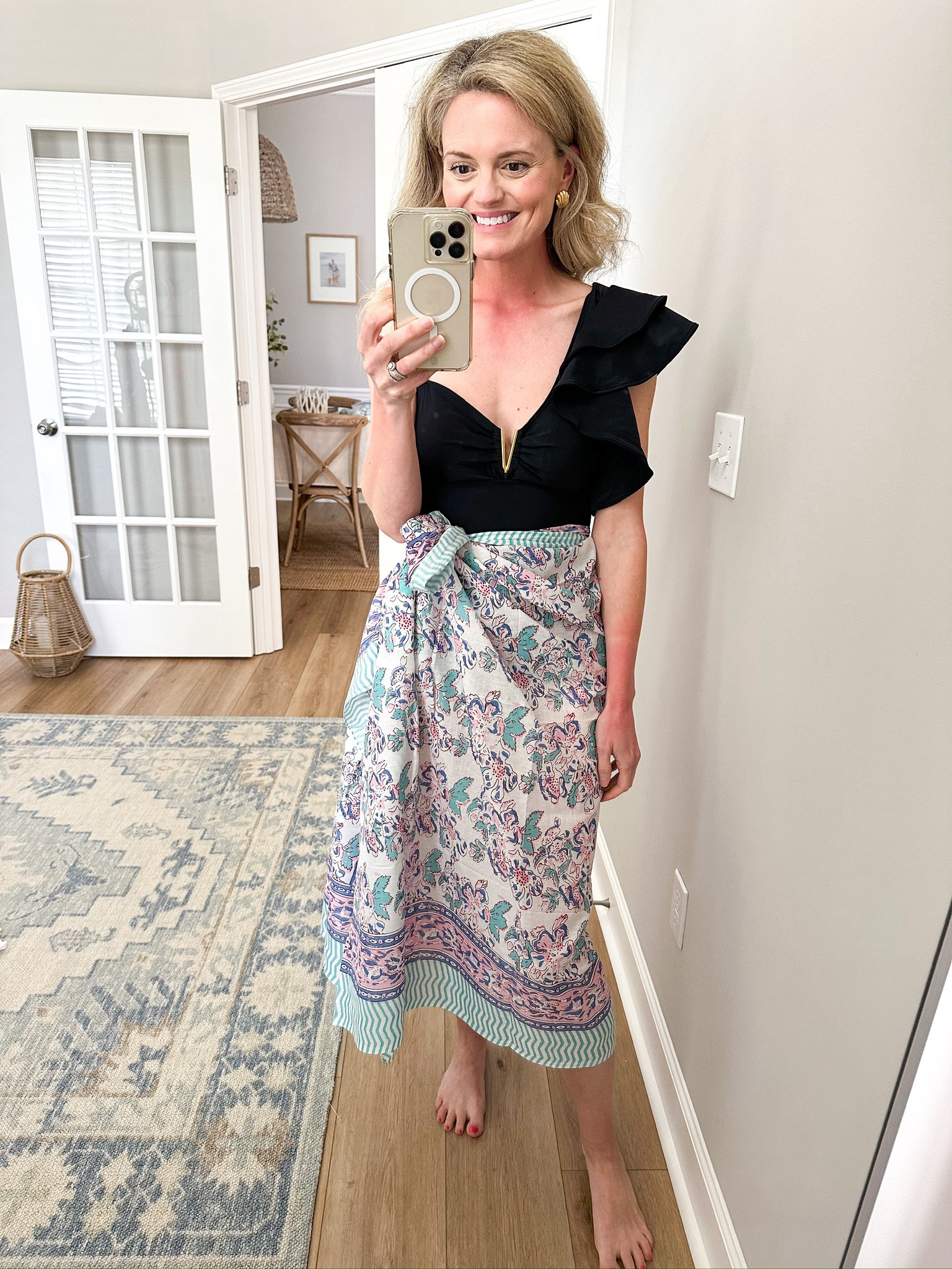 Hello gorgeous one piece swim suit! I love the ruffle detail! The sarong coverup is one of my go to's for the pool or beach. 

#LTKswim #LTKstyletip #LTKtravel