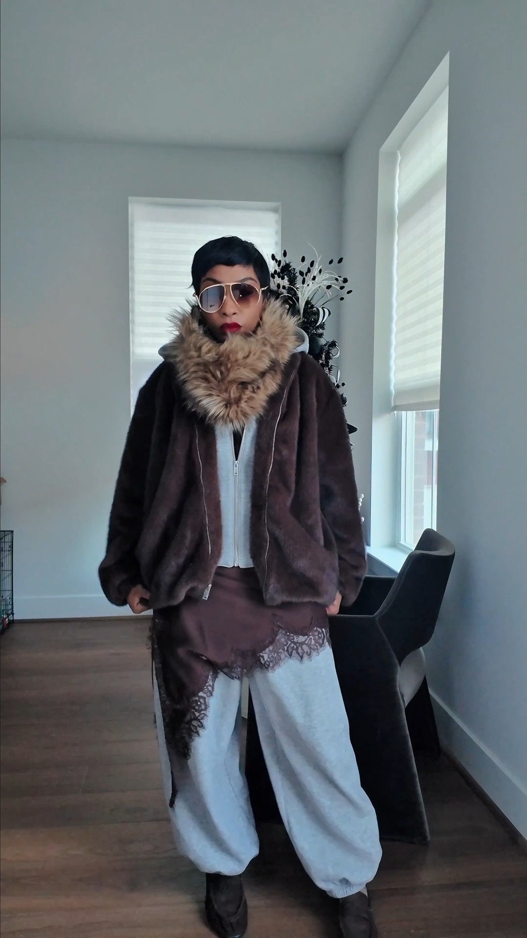 A Lesson In Juxtaposition. 
Juxtaposition works when each piece answers another. This look is built on intentional contrast. Every piece has a purpose and speaks to the other.

The lace slip dress brings softness and femininity. Layering it over jogging pants disrupts expectations and grounds the delicacy with ease and comfort. Refined meets relaxed.

The hoodie keeps the look casual and wearable, while the fur jacket reintroduces luxury and texture, elevating the outfit so it feels polished, not undone.

The suede loafers finish the look with structure. They add richness and stability, tying together the softness, comfort, and sophistication.

Are you for juxtaposition and would you wear a lace dress over joggers or is it too far out of your realm of styling? Sound off below in the comments and let me know how your loving the look. 

For Dets 🔗on the look, comment SHOP! 

#juxtaposition #coolgirlstyle #howtostylevideo #dressoverpants #casualoutfitideas #streetstyle_daily #outfitinspo #styleinspo

#LTKgrwm #LTKSaleAlert #LTKootd