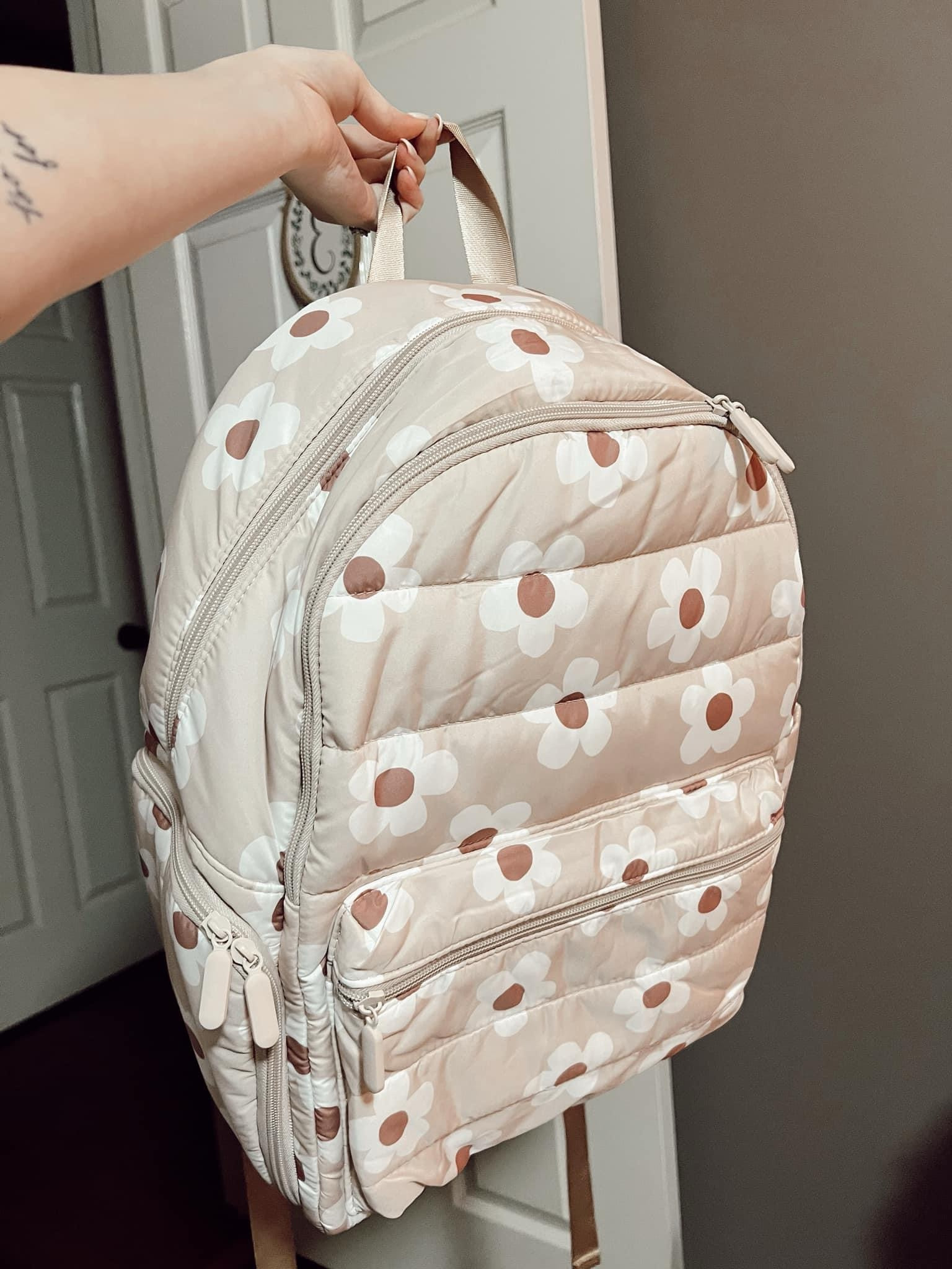 Daisy Travel Backpack! 

This daisy print is no longer available on the website; but Pink Lily has a pink checkered print and a gorgeous pink color available!! 

#LTKMostLoved #LTKtravel #LTKbeauty