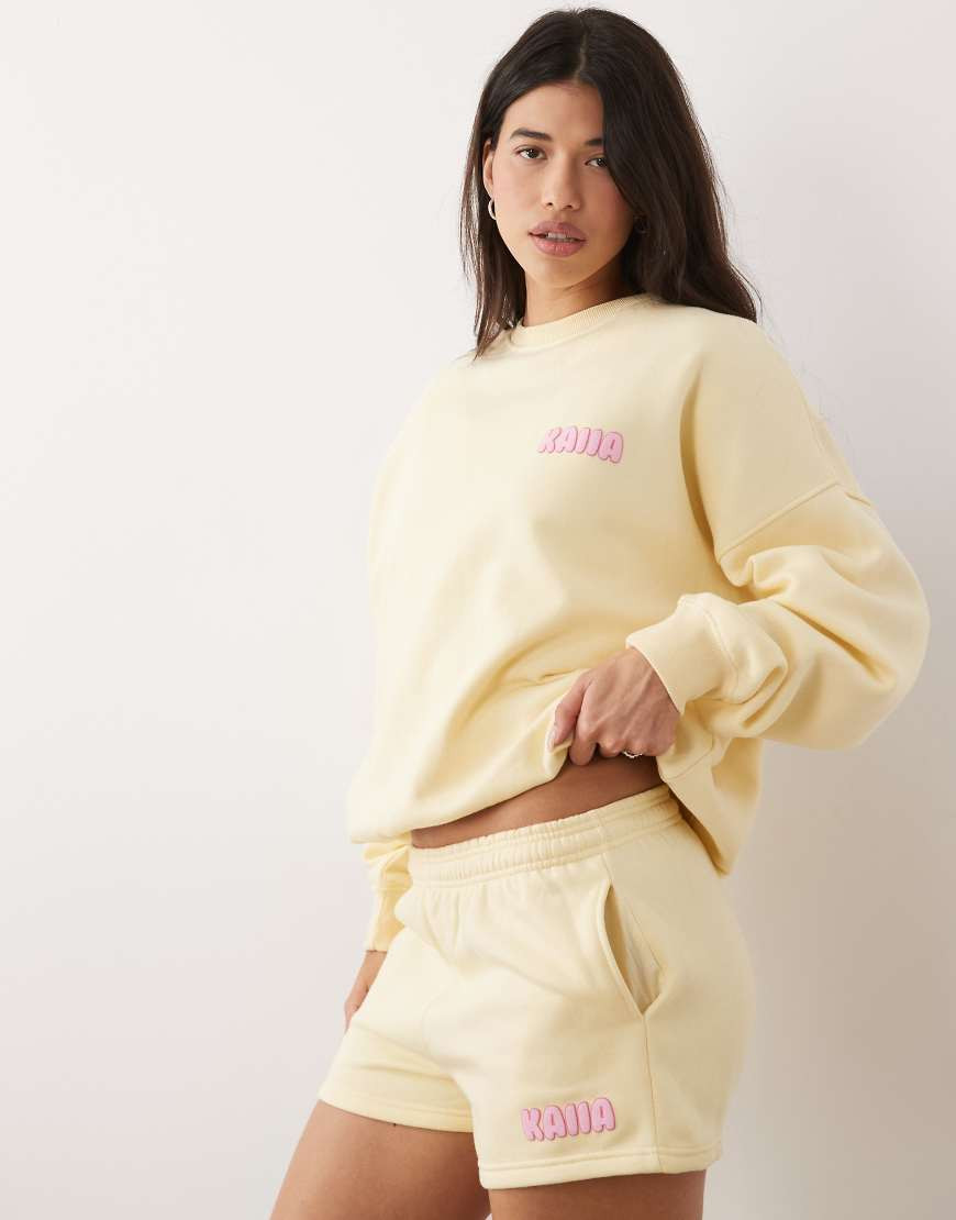 Kaiia cotton rich contrast printed logo sweatshirt fabric mini shorts in lemon & pink - part of a set-Yellow | ASOS (Global)