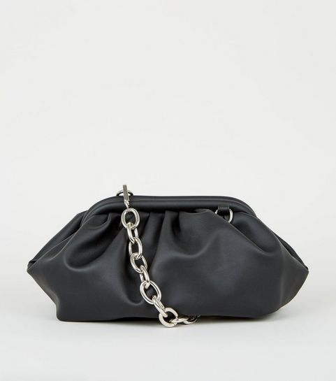 Black Leather-Look Pouch Clutch Bag
						
						Add to Saved Items
						Remove from Saved Items | New Look (UK)