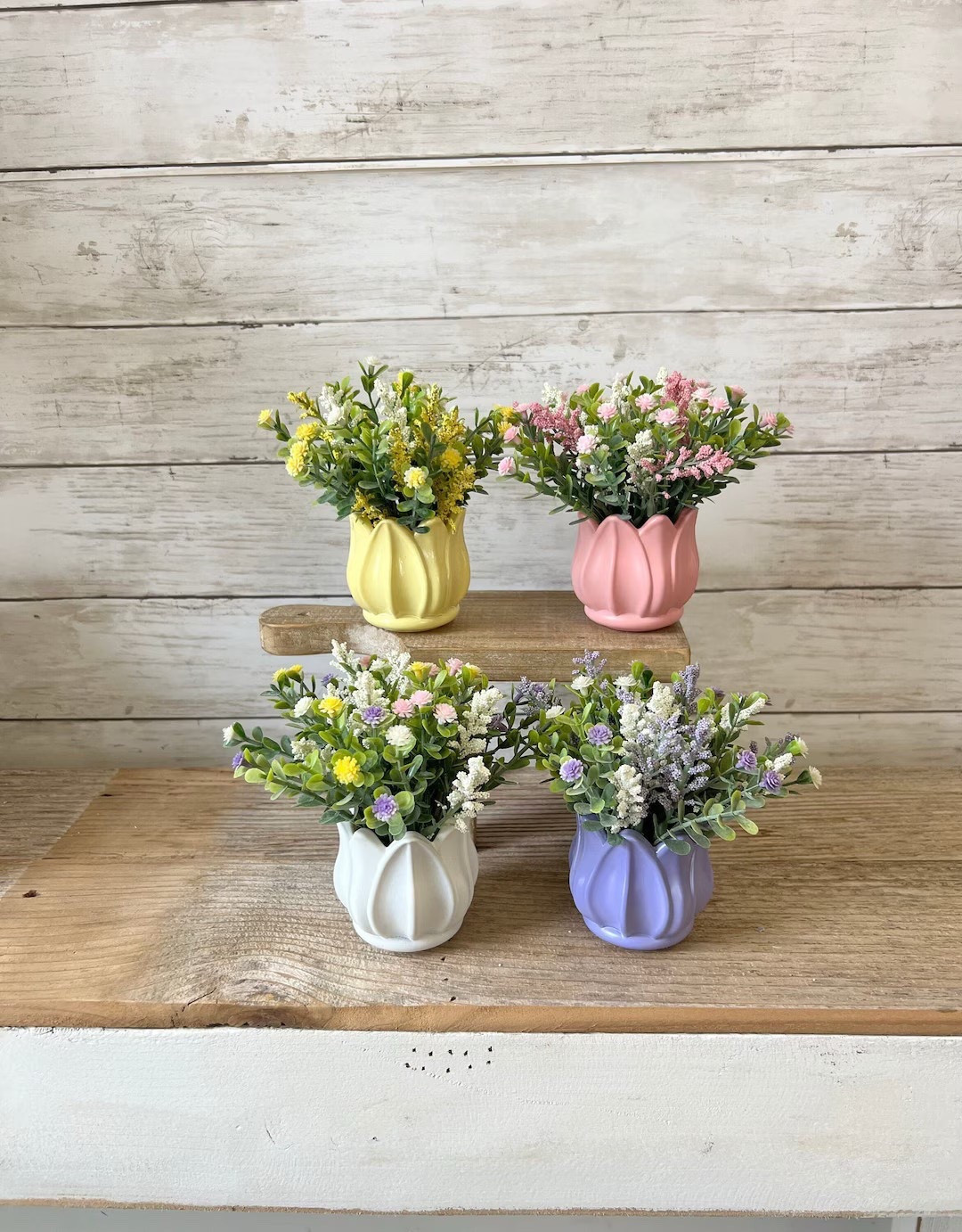 Add a sweet touch of spring to your home with this adorable mini farmhouse floral arrangement. Designed in a painted glass tulip vase and filled with coordinating faux florals and eucalyptus, this petite piece is perfect for shelves, tiered trays, desks, or small spaces that need a pop of seasonal charm. Available in soft spring colors like pink, purple, yellow, or white, this mini arrangement makes a thoughtful gift while supporting a mama-owned small business.

#LTKHome #SpringDecor #FarmhouseDecor #MiniDecor #TieredTrayDecor #SmallSpaceDecor #SpringHome #FloralDecor #FarmhouseStyle #HomeDecorFinds #GiftIdeas #SmallBusinessLove #MamaOwnedBusiness #LTKFinds #SpringStyling #HomeInspiration 

#LTKWedding #LTKSeasonal #LTKHome