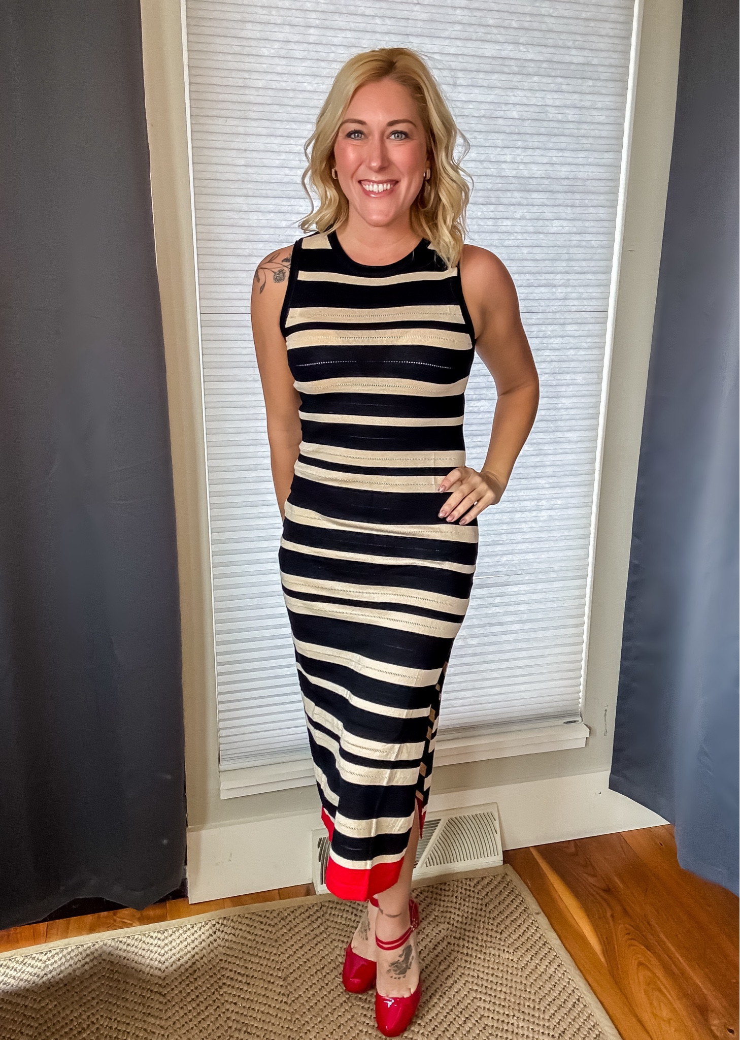 This dress is 🔥🔥🔥! It’s made from a stretchy sweater material that is crazy flattering… so sassy and classy with my red pumps!