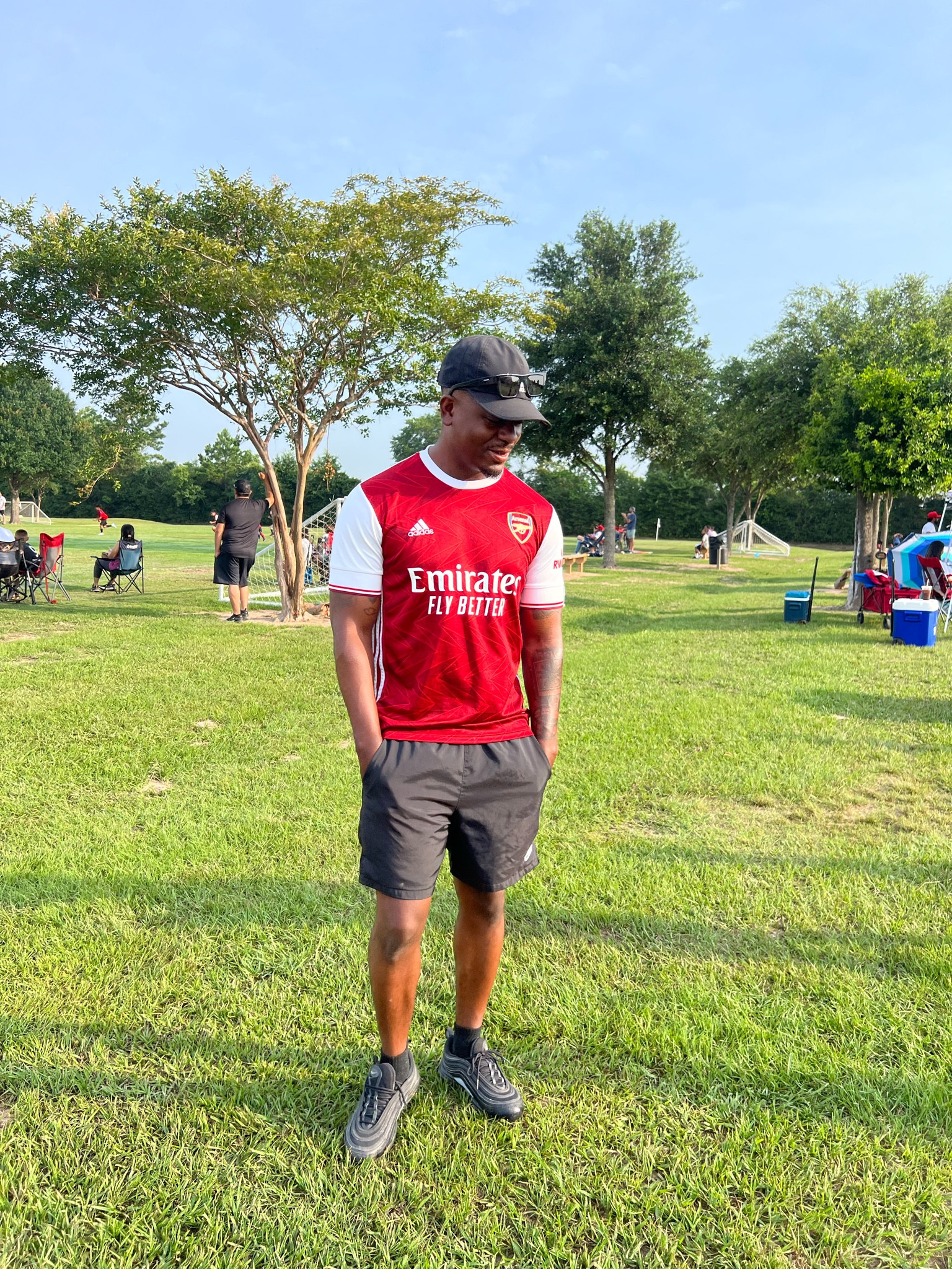 Nike hat, Nike black shorts, black airmax, arsenal jersey 

#LTKstyletip #LTKmens #LTKshoecrush