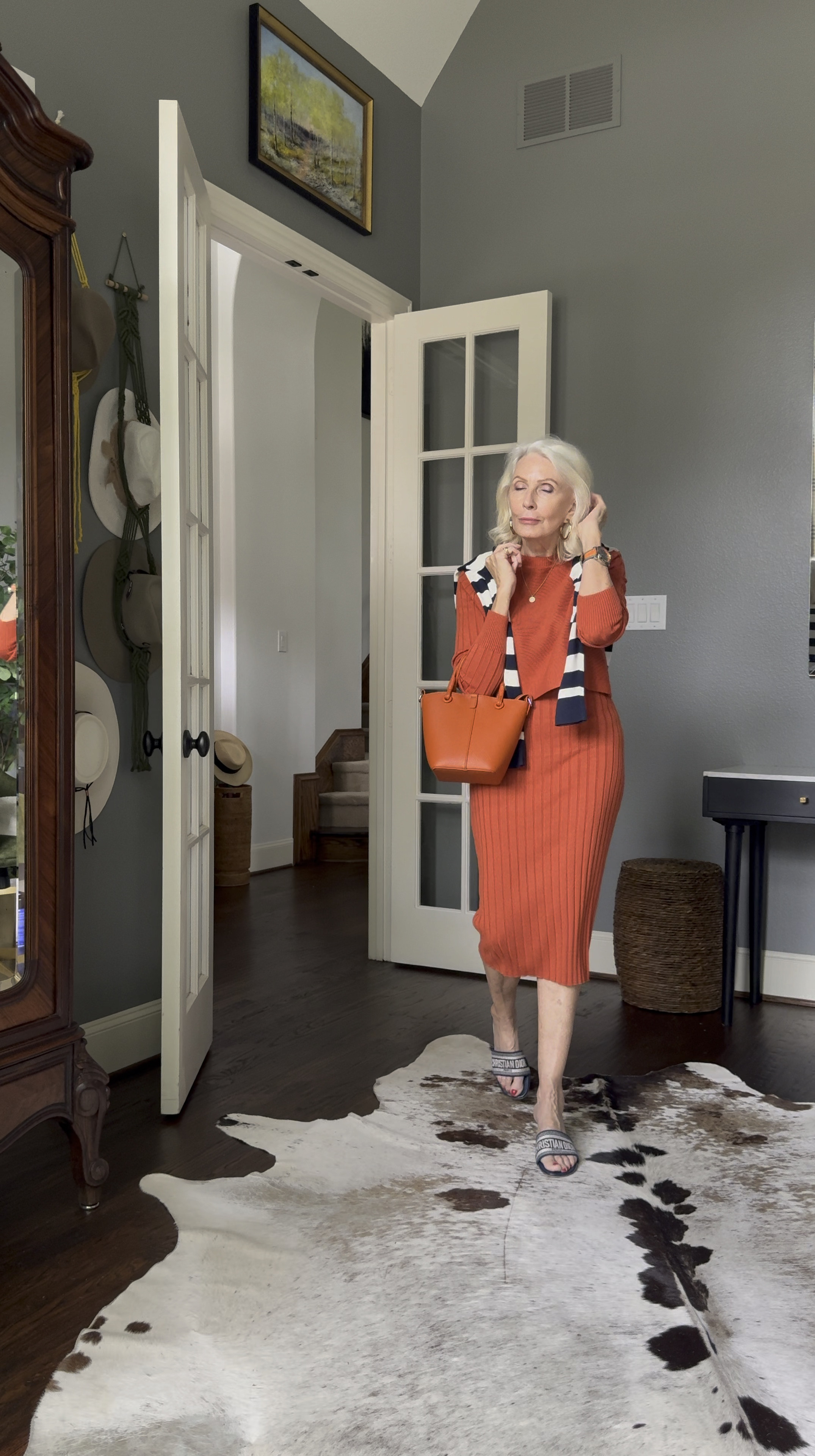 It’s a tank dress or it’s a sweater dress  or it’s just a sweater. This three in one knit piece is your perfect travel companion I chose the orange for my trip, but they come in so many great colors
For reference, I’m in a size small

#LTKVideo #LTKOver40 #LTKStyleTip