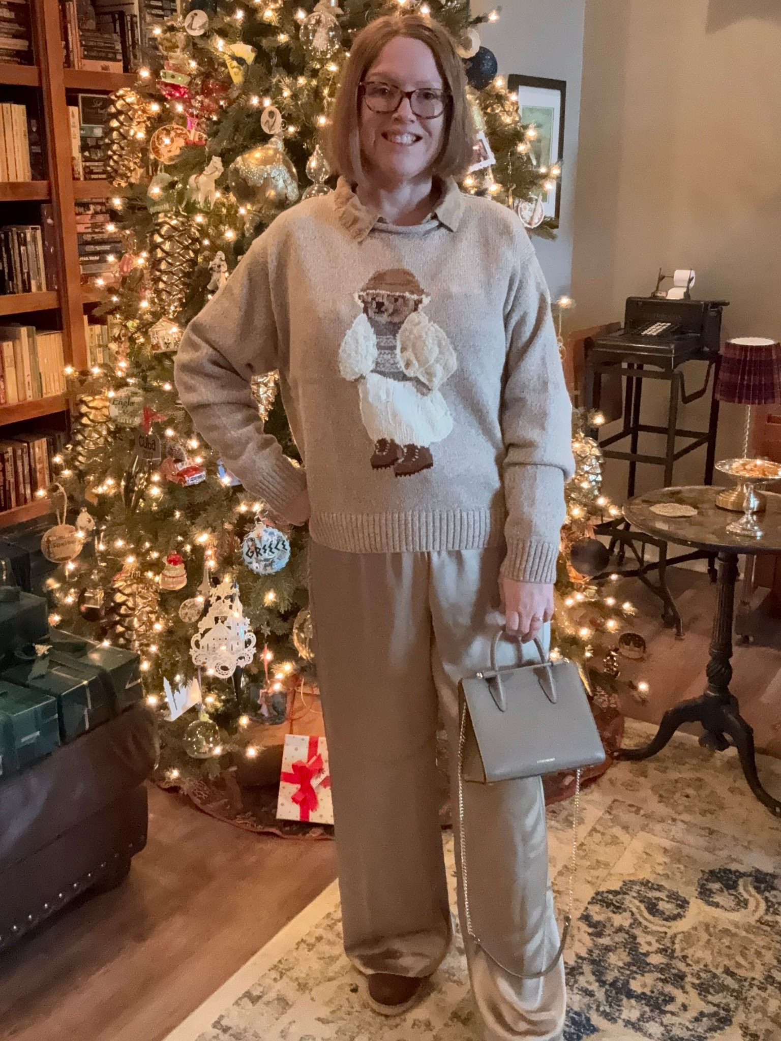 SALE ALERT! These satin pants from Loft are only $30 right now and they come in a variety of colors. I’m wearing an XL and they are a roomie fit for a size 16. They have them up to XXL. Pairing them with this comfy Ralph Lauren bear sweater makes a warm and fun outfit for winter  

#LTKOver40 #LTKHoliday #LTKMidsize