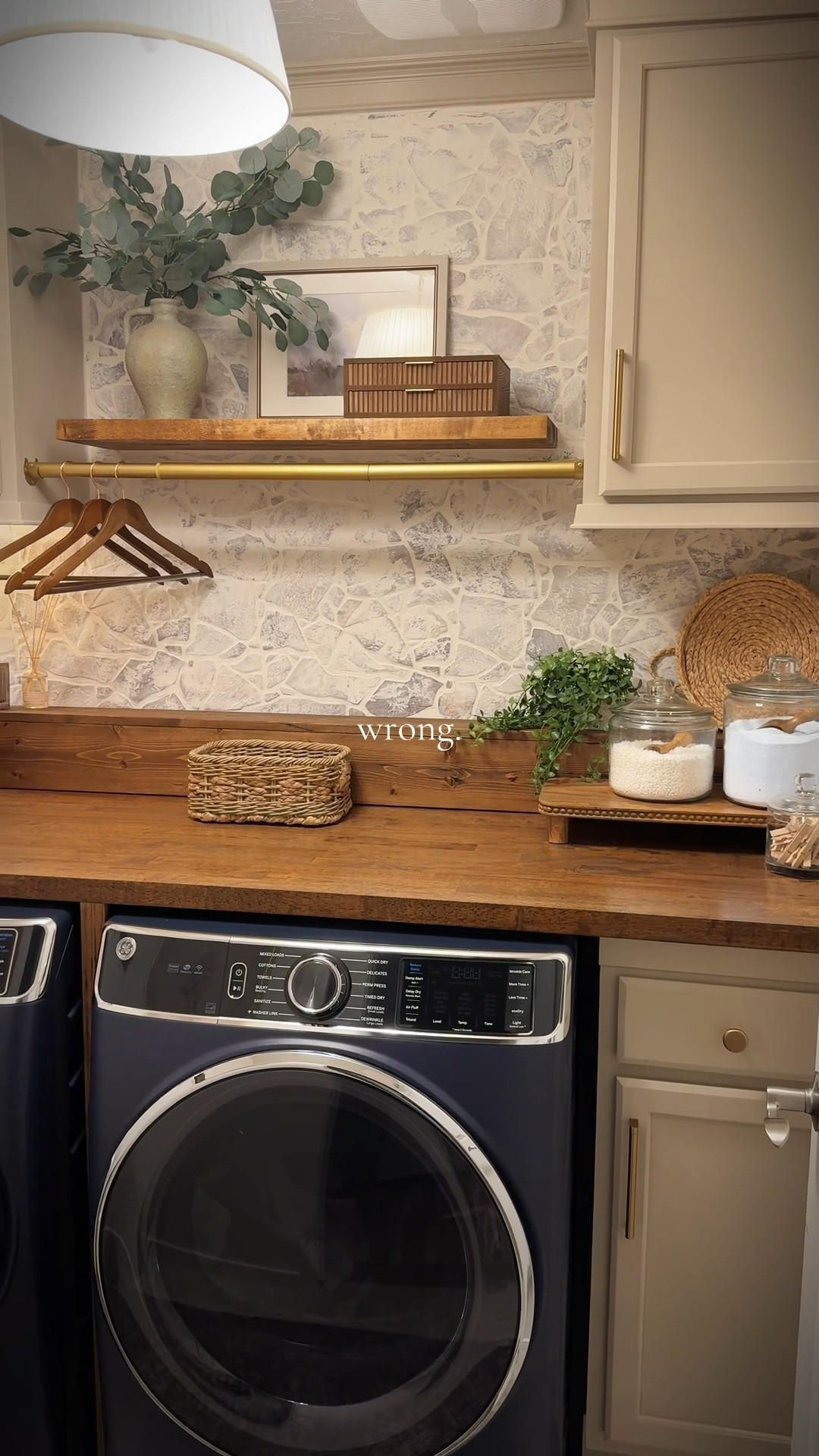 It was time for a laundry room upgrade, so we ditched the stack and built a custom counter and storage solution with cabinetry from @lowes, and then finished it off with a faux stone German schmear wall, gold accents and decor to make it cozy and beautiful- exactly the kind of place you don’t mind spending time doing chores! #laundryroom #homedecor #diyhomeprojects

#LTKHome