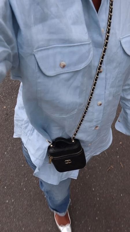 1 light blue linen button up shirt styled 2 ways, both with Moussy Vintage jeans, a Chanel bag and Dolce Vita flats 

#LTKVideo #LTKSeasonal #LTKstyletip