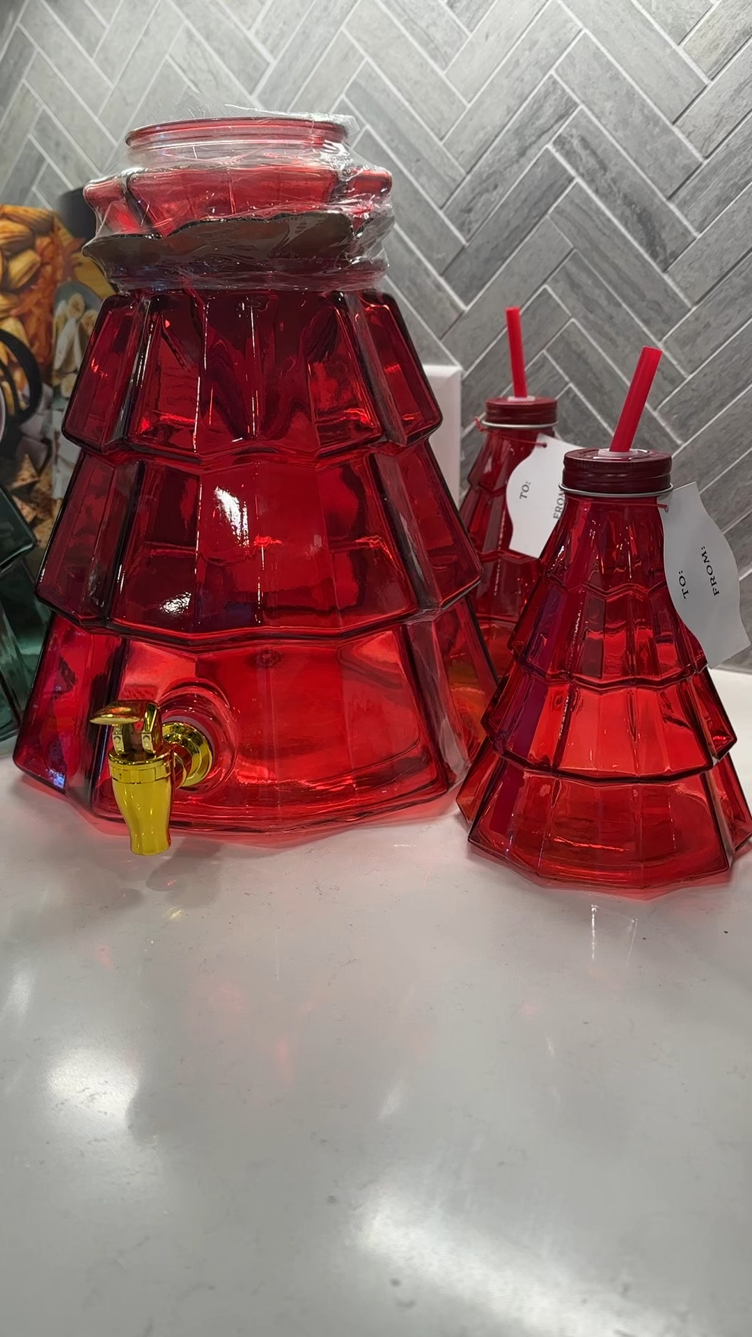 Holiday Drink Dispenser and glass tree sippers 

#LTKSeasonal #LTKparties #LTKHoliday