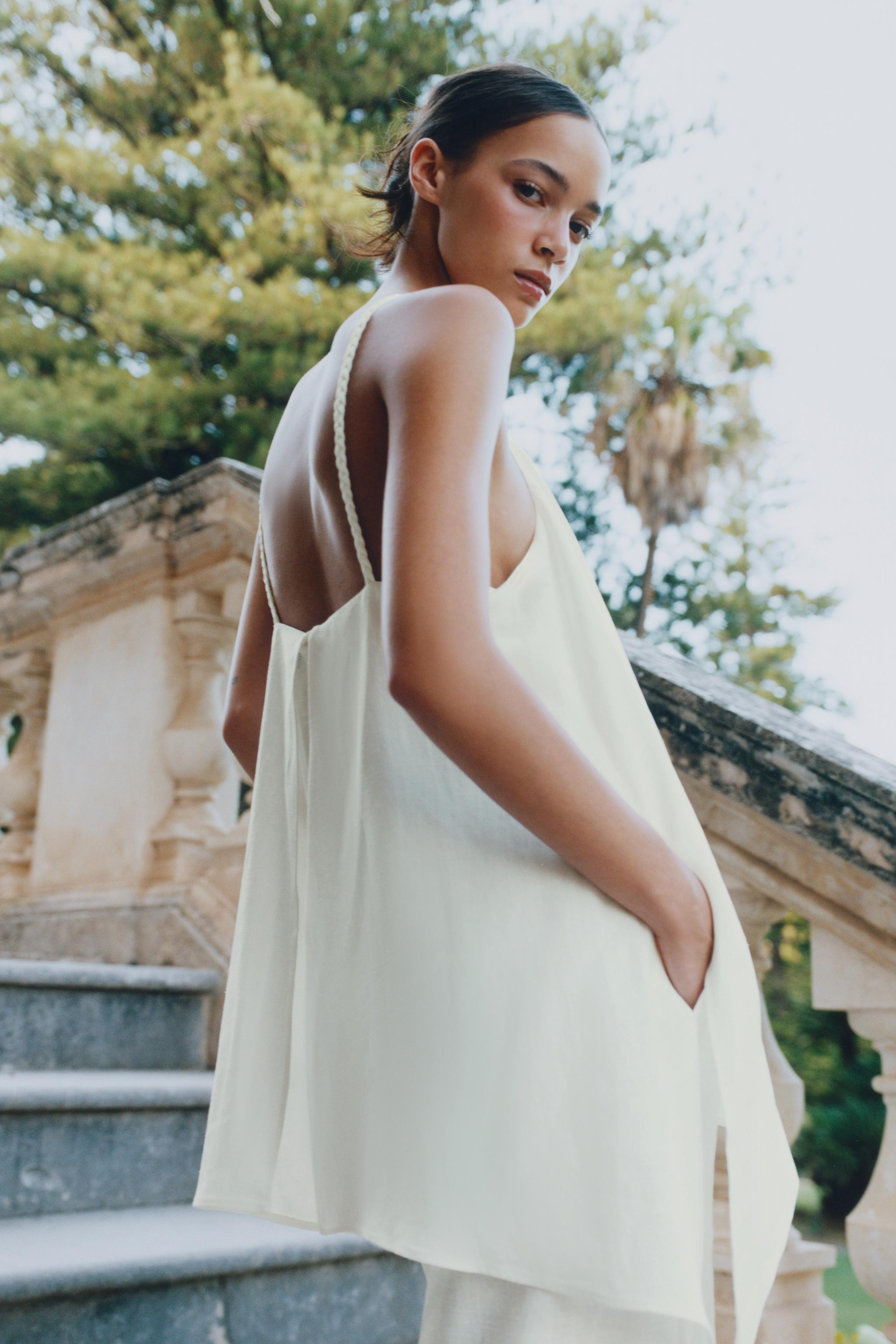 Jumpsuit made of ramie. Halter neckline with spaghetti straps. Hidden in-seam side pockets. Wide ... | Zara US