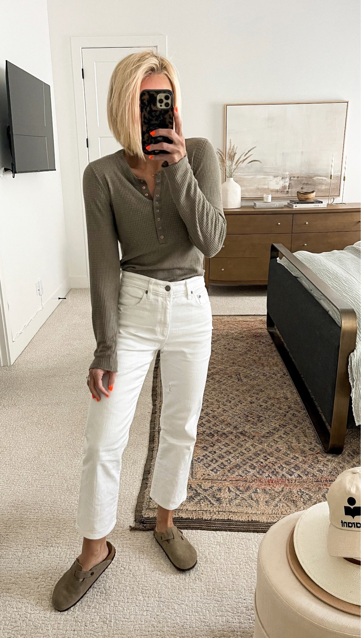 One of my most worn tops when the temps cool. Love the little rose gold snaps. I always size up to large for a looser fit & length. White jeans and clog Birkenstocks. Fall outfit 


#LTKunder50 #LTKSeasonal #LTKstyletip