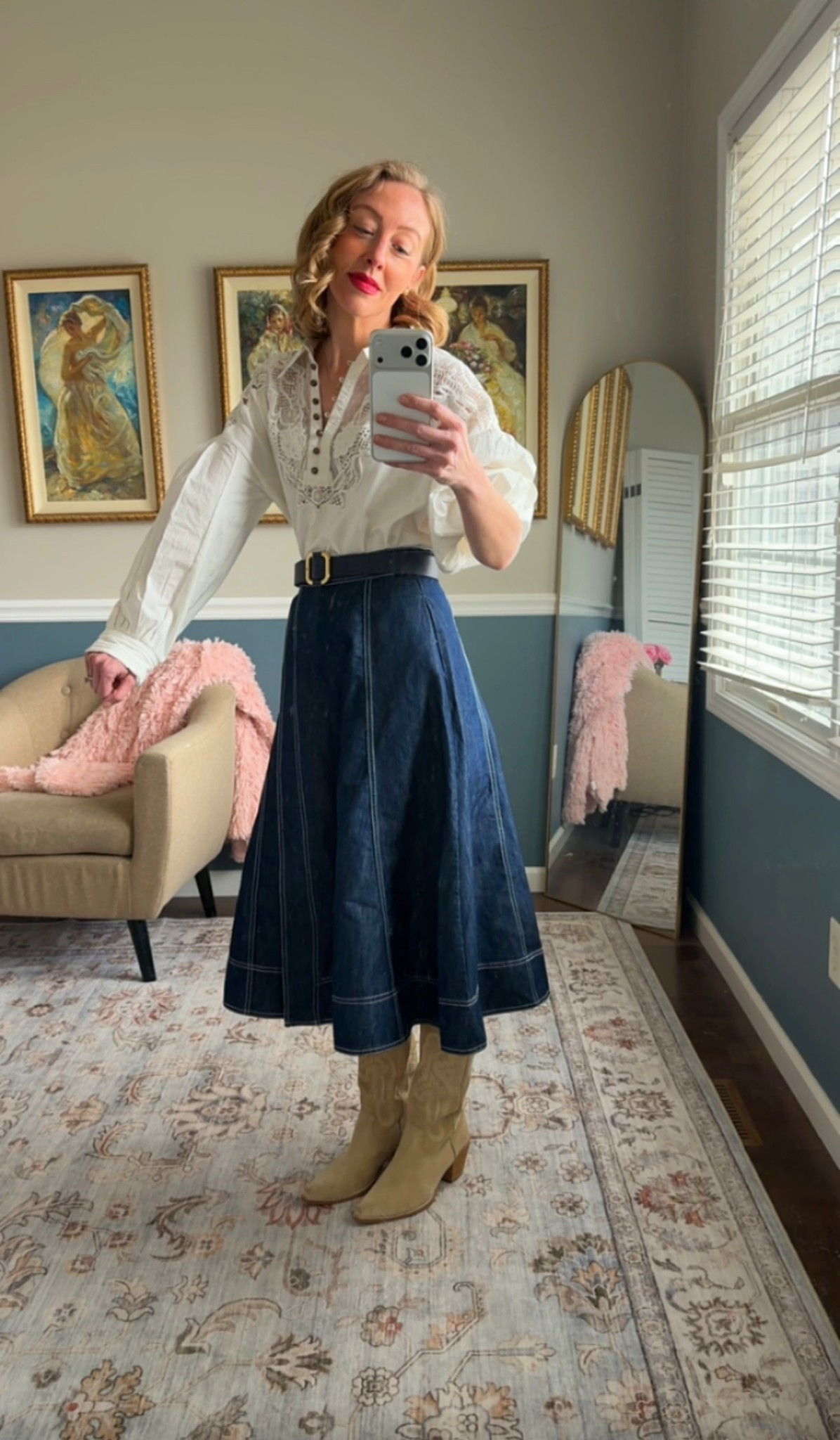 White embroidered long-sleeve blouse, dark denim A-line midi skirt, navy belt, and tan suede boots.

Classic heritage-inspired spring outfit.

Timeless American style.


#LTKootd #LTKOver40 #LTKSeasonal