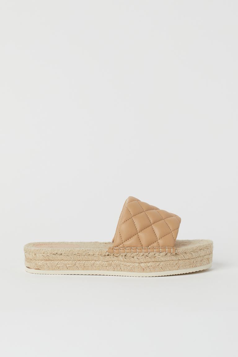 Mules with open toes and a padded, quilted foot strap in imitation leather. Soles with a braided ... | H&M (UK, MY, IN, SG, PH, TW, HK)