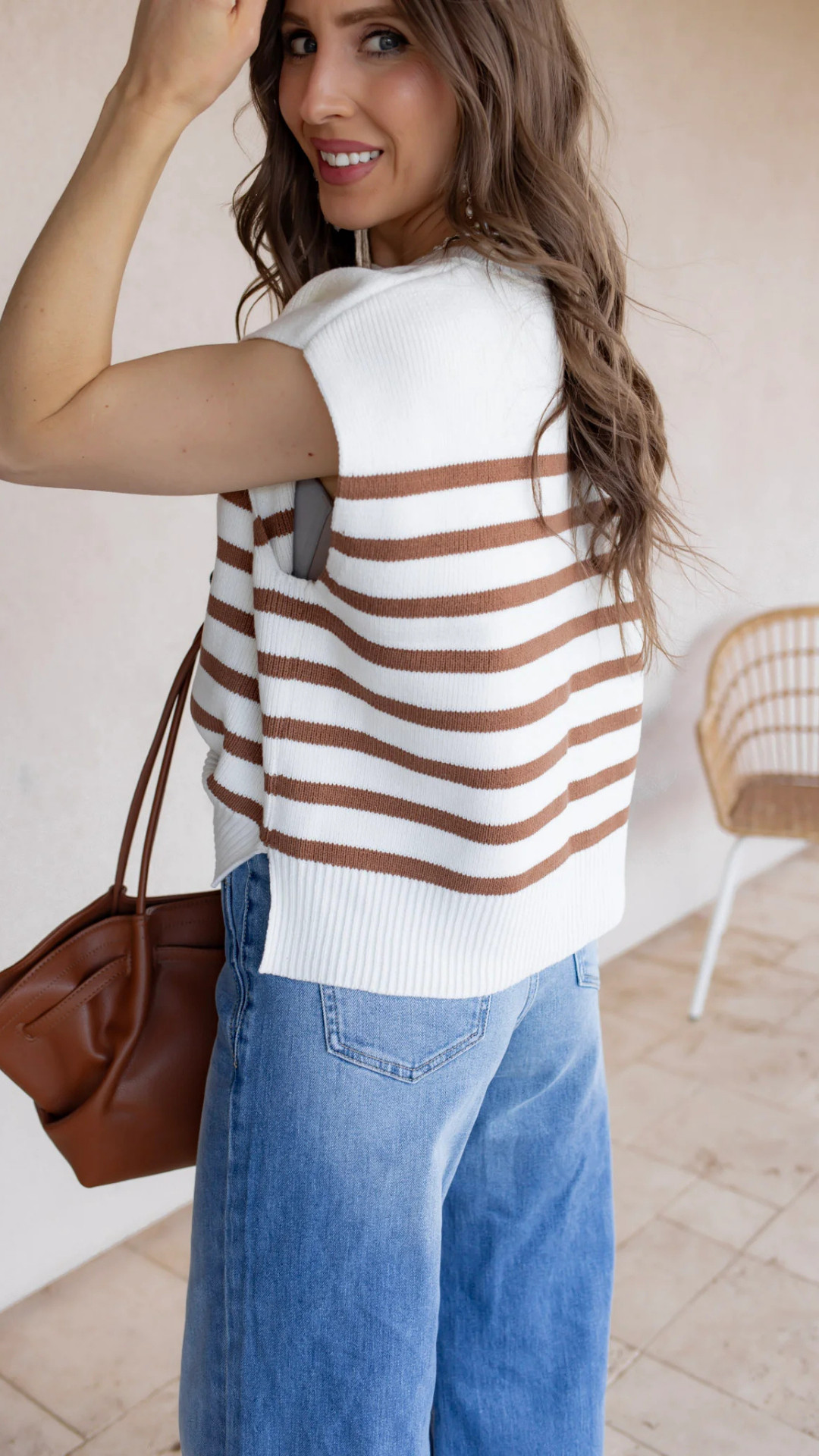 A relaxed fit and classic stripes make this sweater vest a wardrobe staple. Whether styled with denim or tailored pants, it brings easy sophistication and cozy layering to your everyday outfits.

Hashtags:
#StripeStyle #SweaterVestTrend #KrushKandyFashion #CasualLayers #BoutiqueFinds #EffortlessOutfit #ChicComfort 

 #LTKgrwm #LTKootd #LTKmomlife