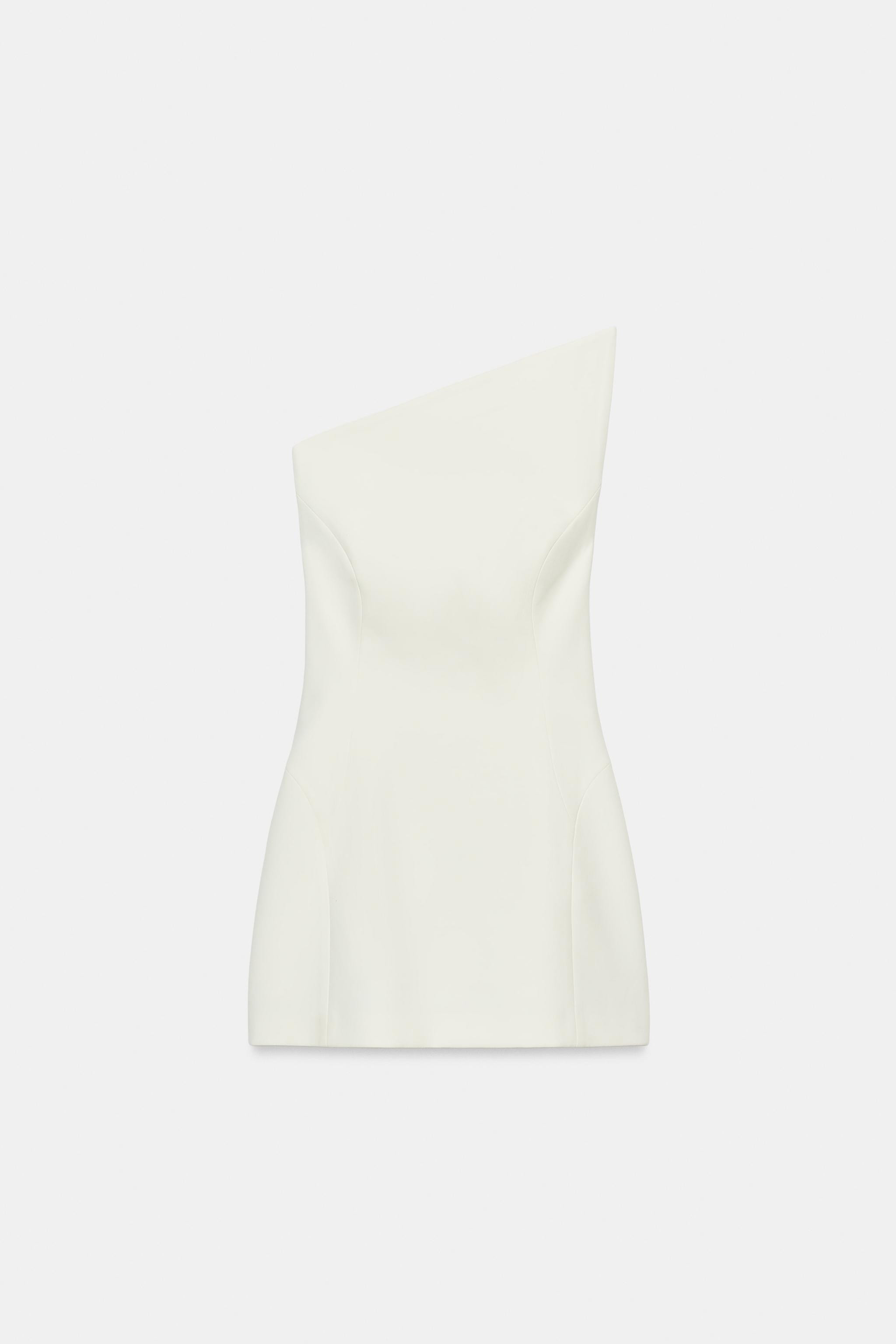 Mini dress with an asymmetric neckline and off-the-shoulder design. Featuring interior boning and... | Zara UK