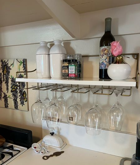Wine glass rack and shelf from Anthropologie 
I’m in love! Functional and beautiful 

#LTKhome
