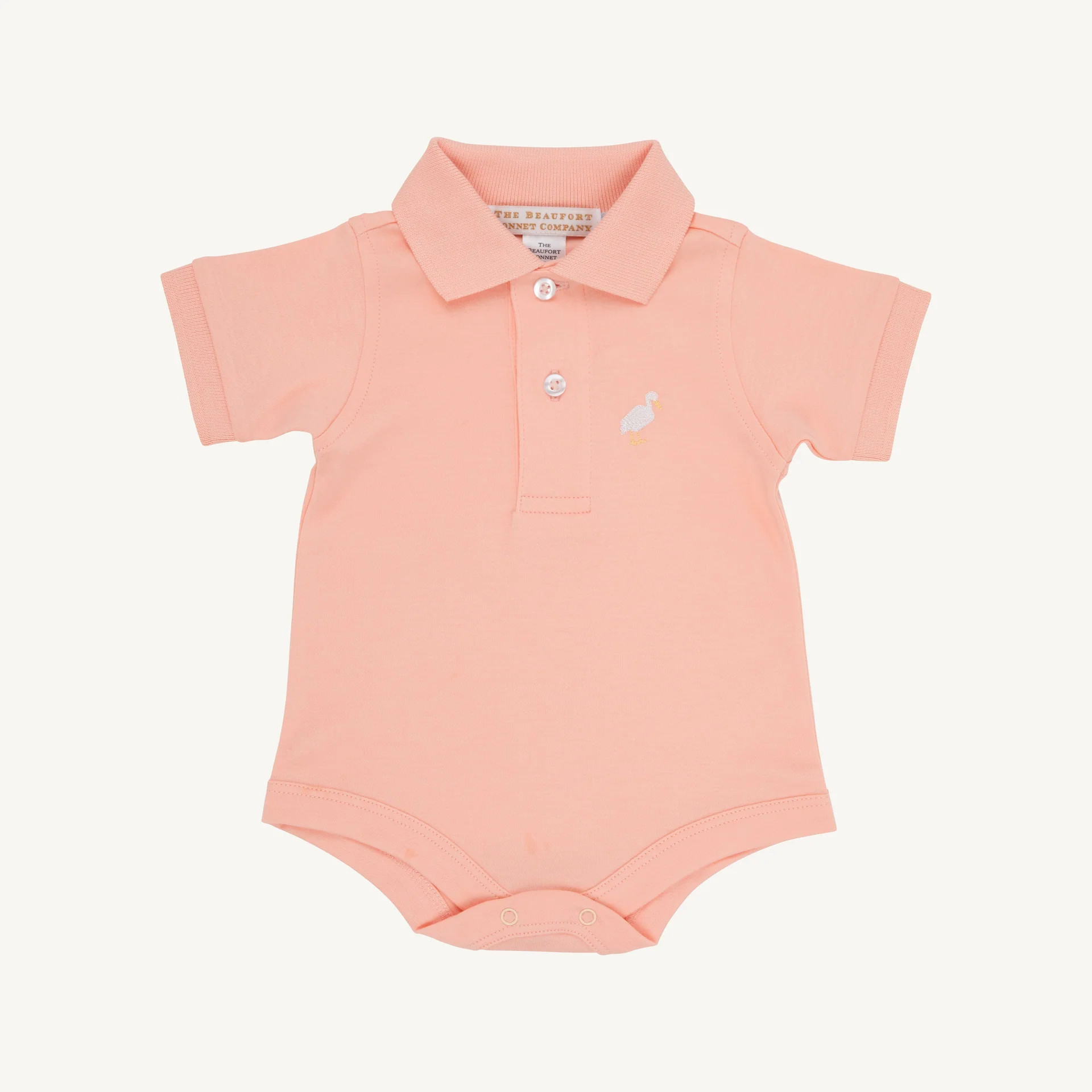 Prim & Proper Polo & Onesie - Pompano Peach with Multicolor Stork | The Beaufort Bonnet Company