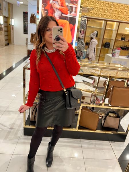 Red sweater | pom sweater | holiday outfit | leather skirt | faux leather | black boots  | Pochette Métis | holiday style | holiday outfit 

#LTKSeasonal #LTKHoliday #LTKstyletip