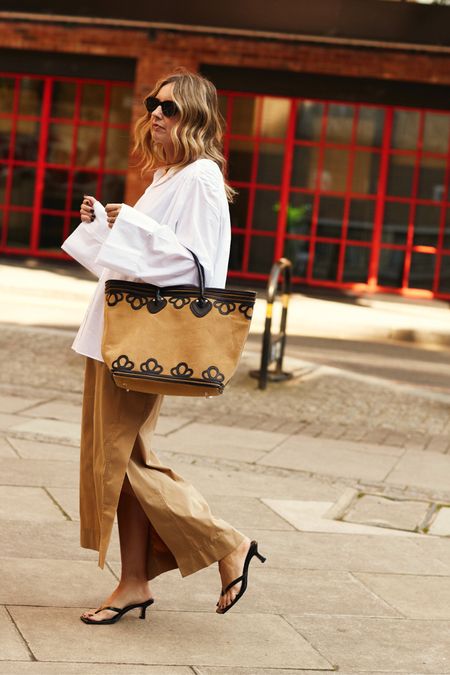 AD Summer in the city with NETAPORTER | Beige skirt + white shirt + sandals | casual outfit | work outfit | NETAPORTER Edit | Bode Bag | suede bag 

#LTKeurope #LTKstyletip #LTKsummer