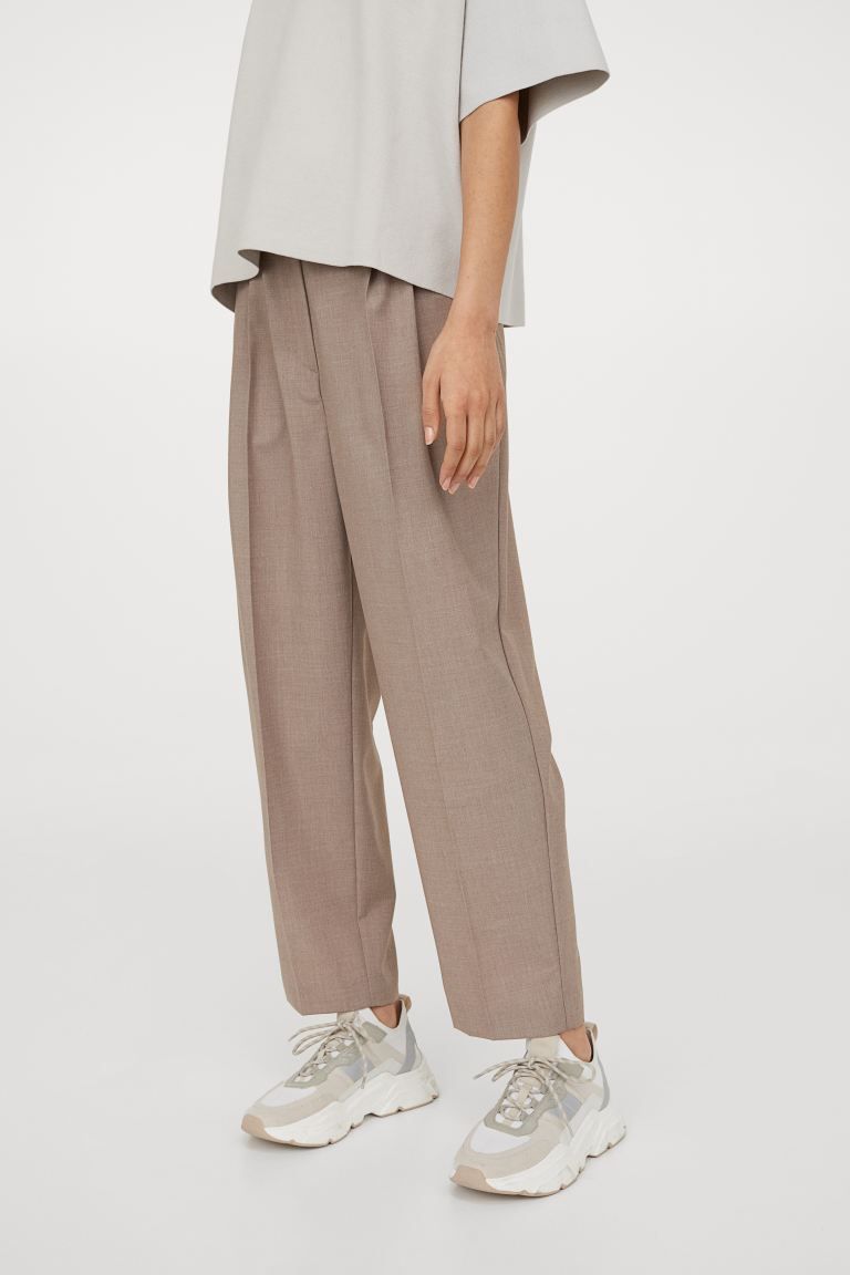 Ankle-length pants in woven fabric. High waist, waistband with covered elastic at back, and zip f... | H&M (US + CA)