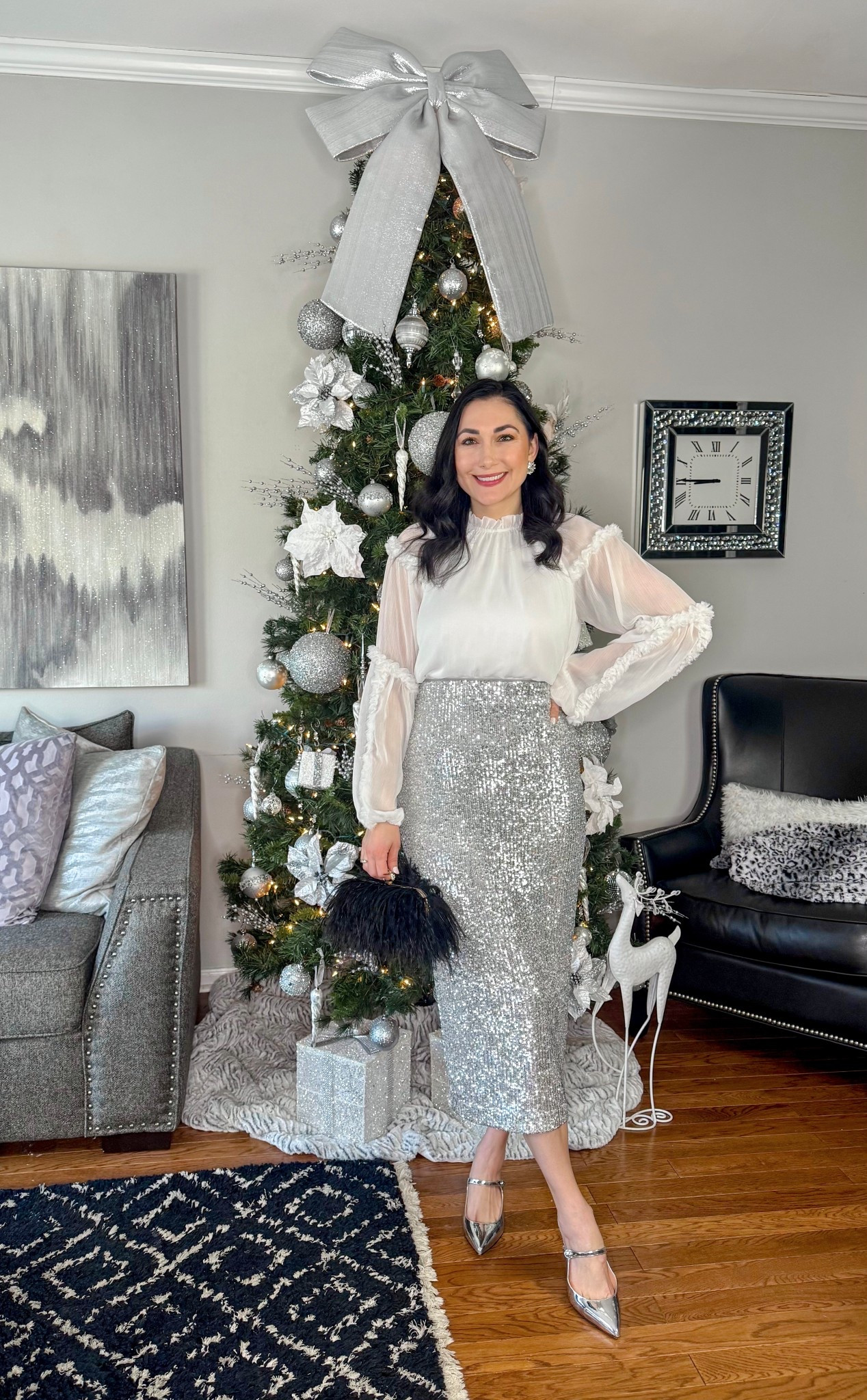 Classy holiday outfit 🤍🩶

White blouse 
Silver sequin midi skirt 
Silver mule heels 
Black feather bag 

NYE outfit 
New Year’s Eve outfit 
Holiday party 

#LTKSeasonal #LTKHoliday #LTKBeauty